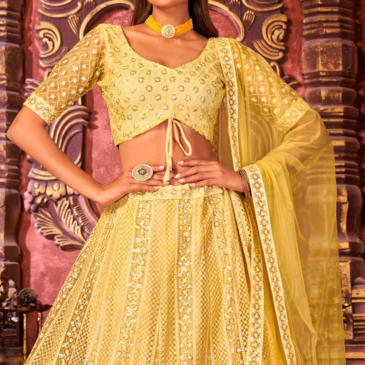 Yellow Floral Sequins Embroidered Net Lehenga Choli