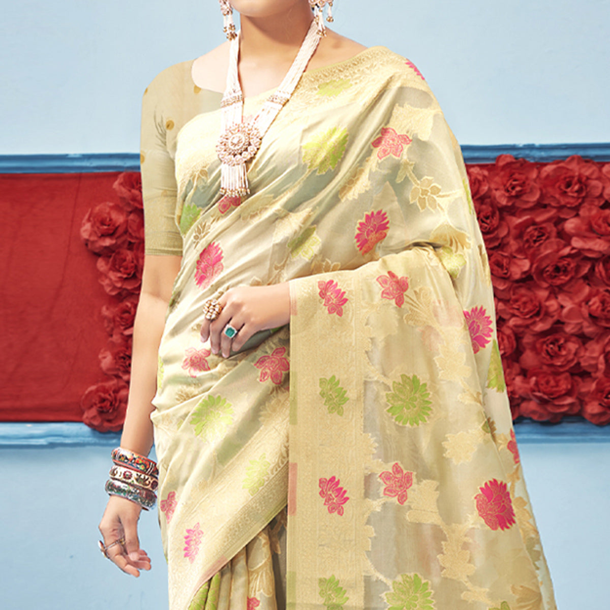 Cream Woven Organza Saree With Tassels