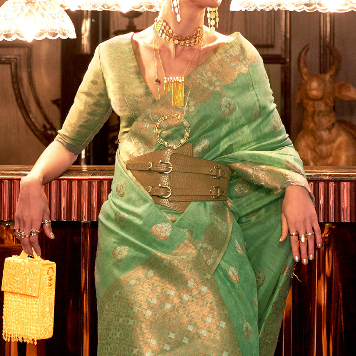 Pista Green Woven Linen Saree With Tassels