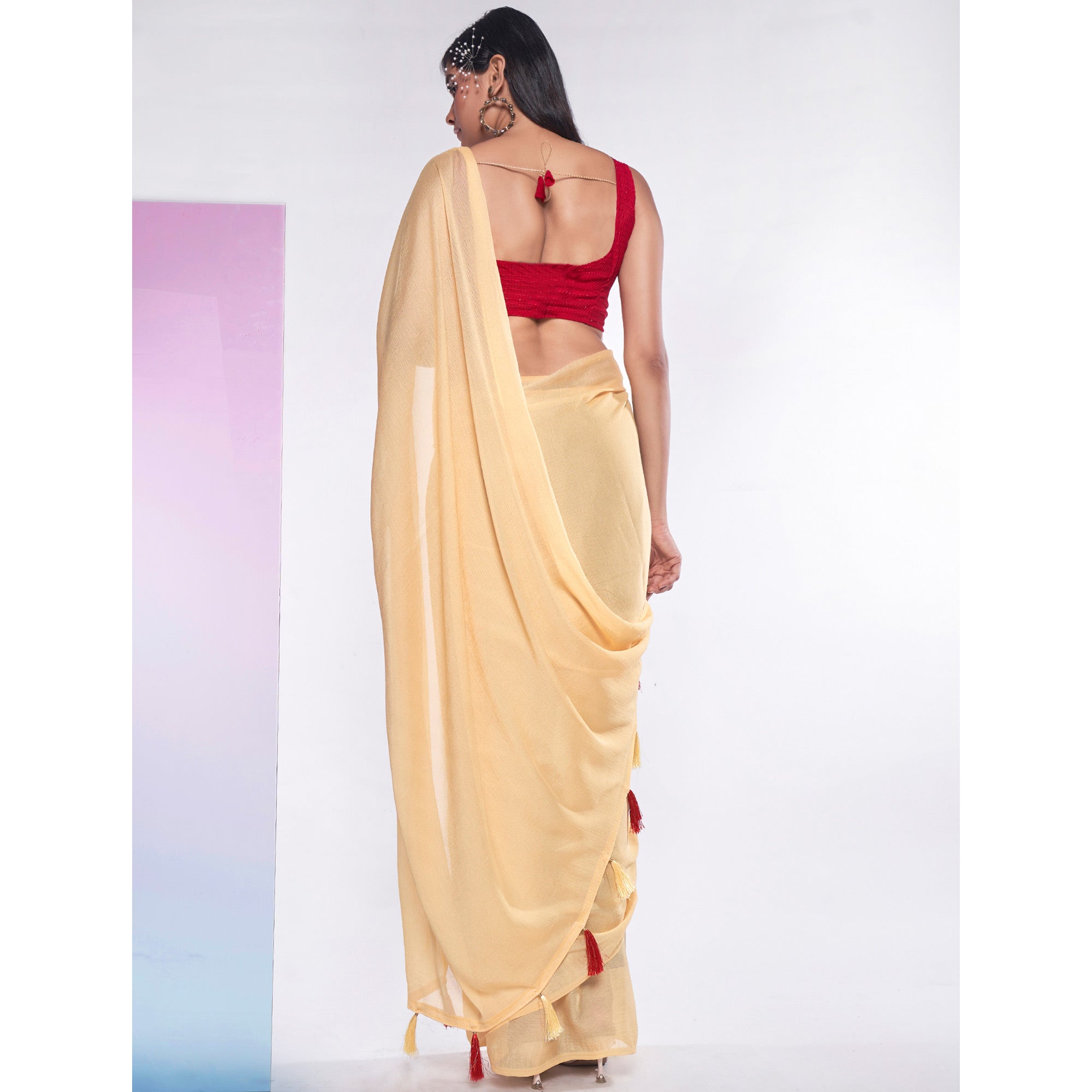 Yellow Solid Georgette Saree With Tassels