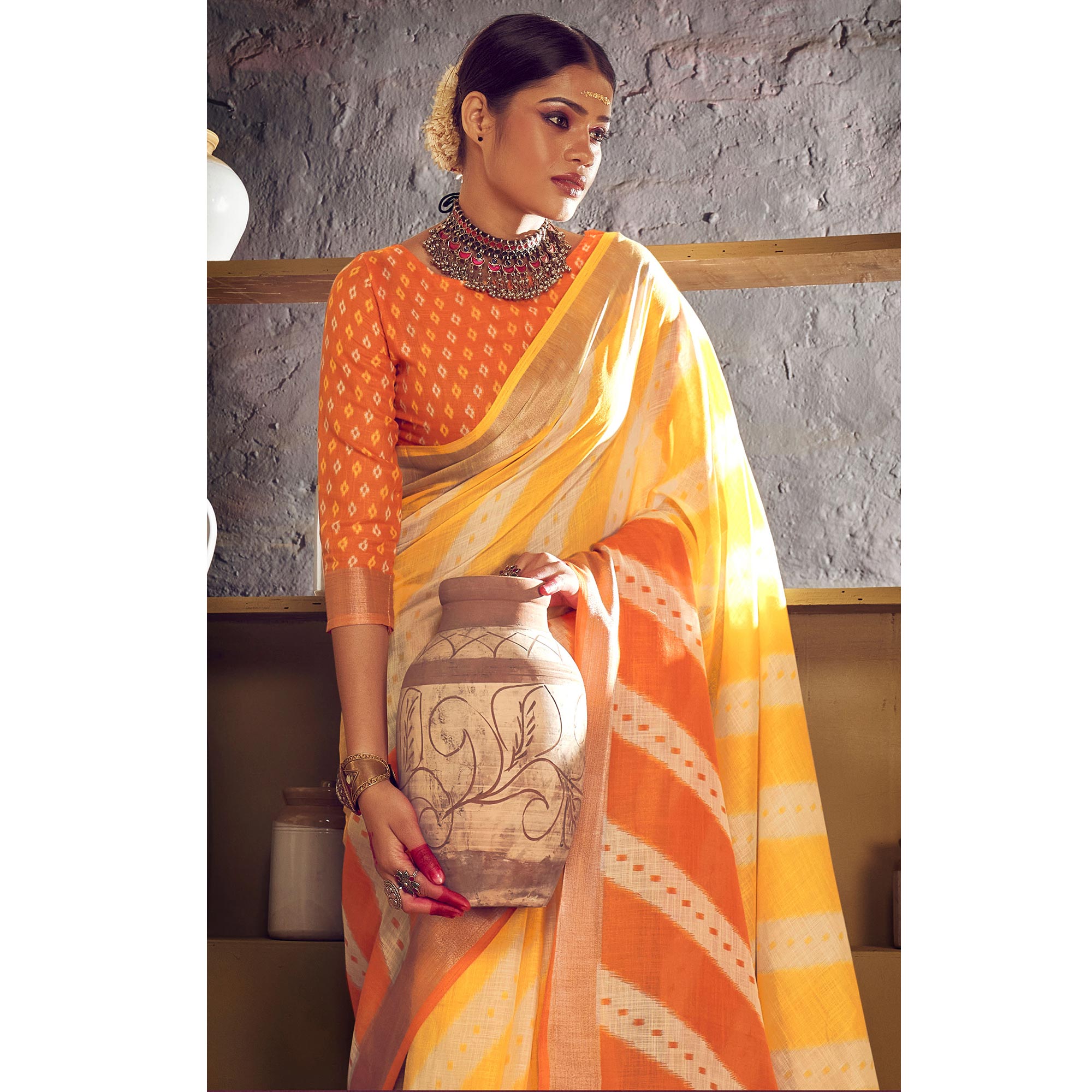 Yellow & Orange Printed With Zari Border Linen Saree