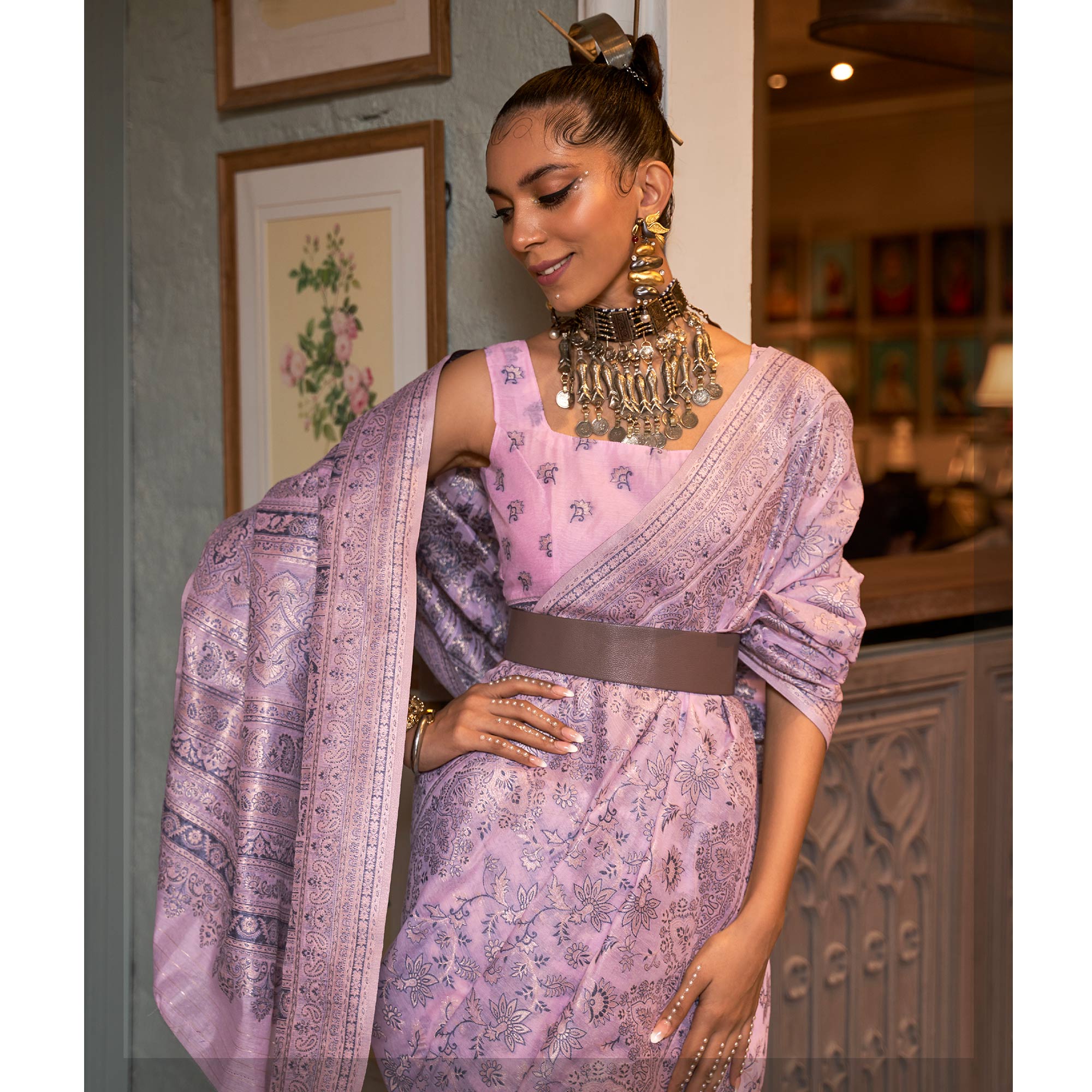 Pastle Pink Floral Woven Modal Saree With Tassels