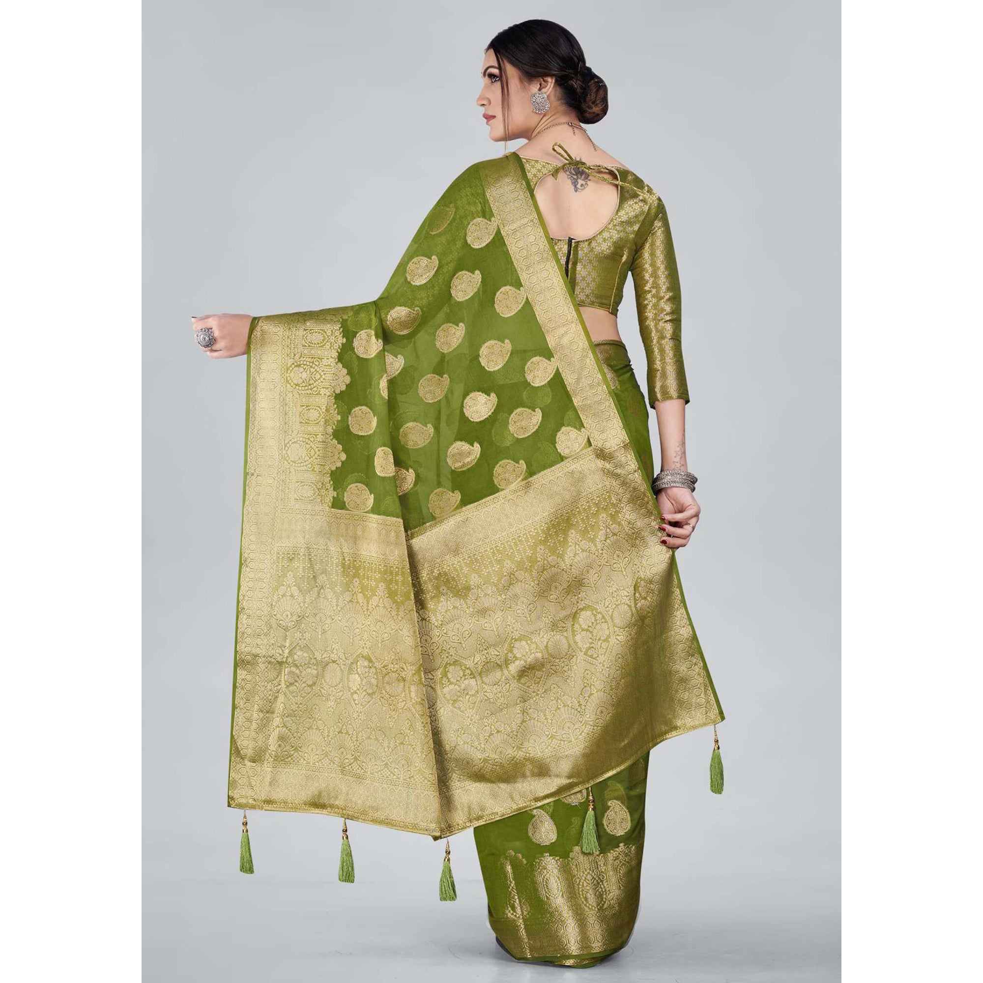 Green Woven Organza Saree With Tassels