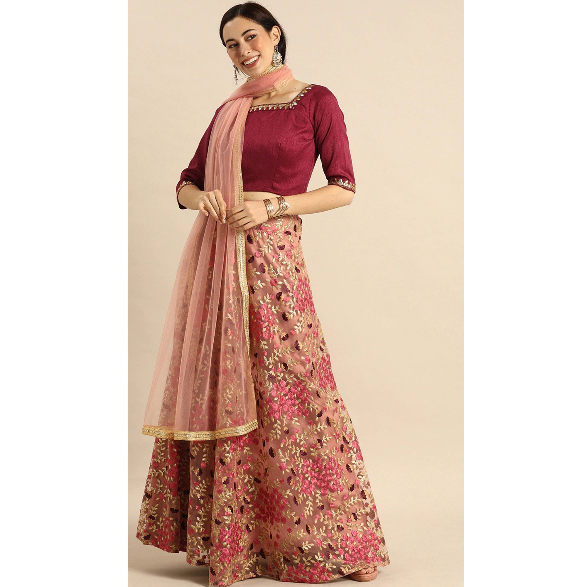 Peach Floral Embroidered Netted Lehenga Choli