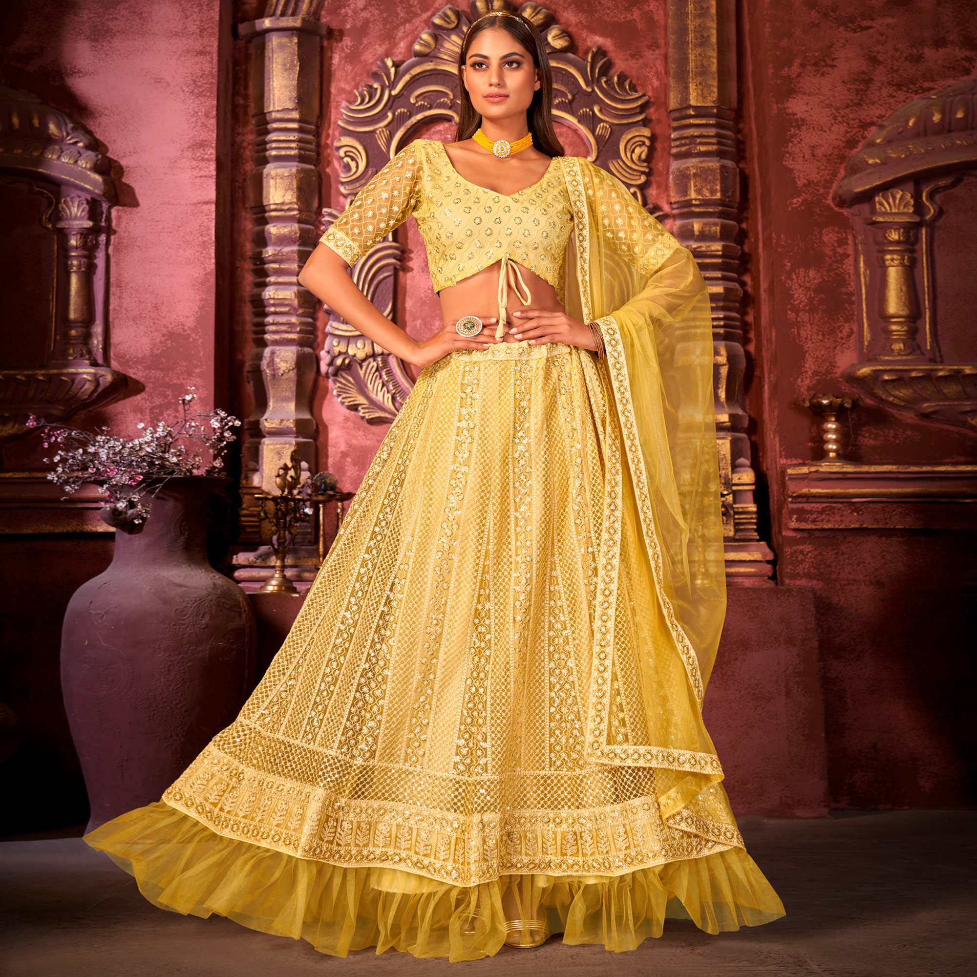 Yellow Floral Sequins Embroidered Net Lehenga Choli