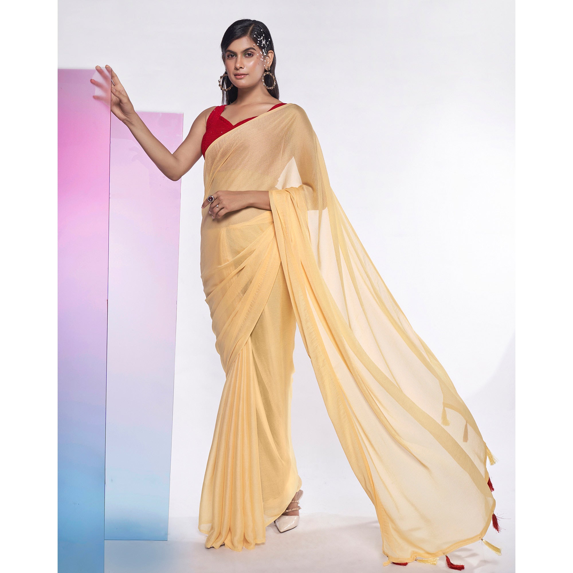 Yellow Solid Georgette Saree With Tassels