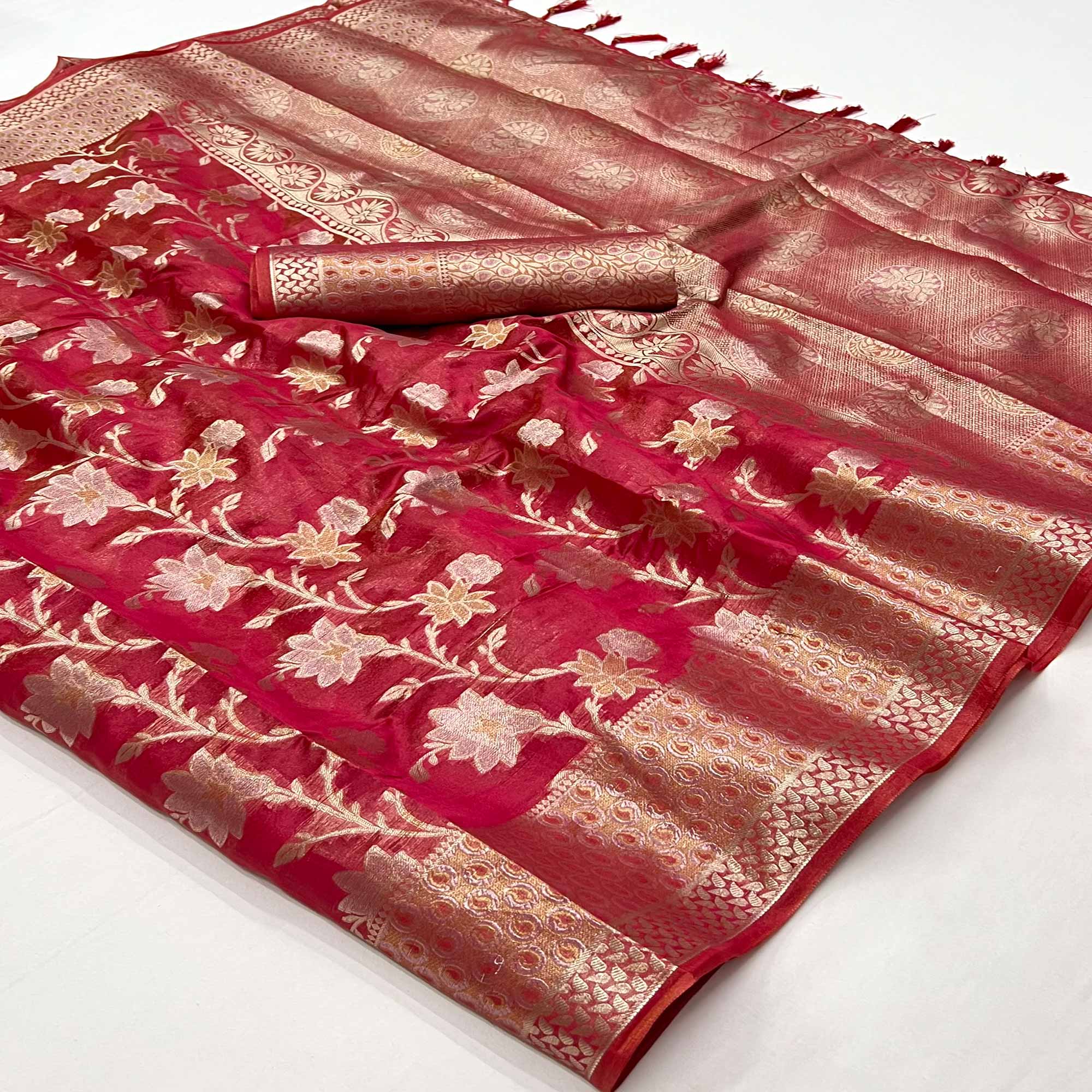 Rani Pink Floral Woven Organza Saree With Tassels