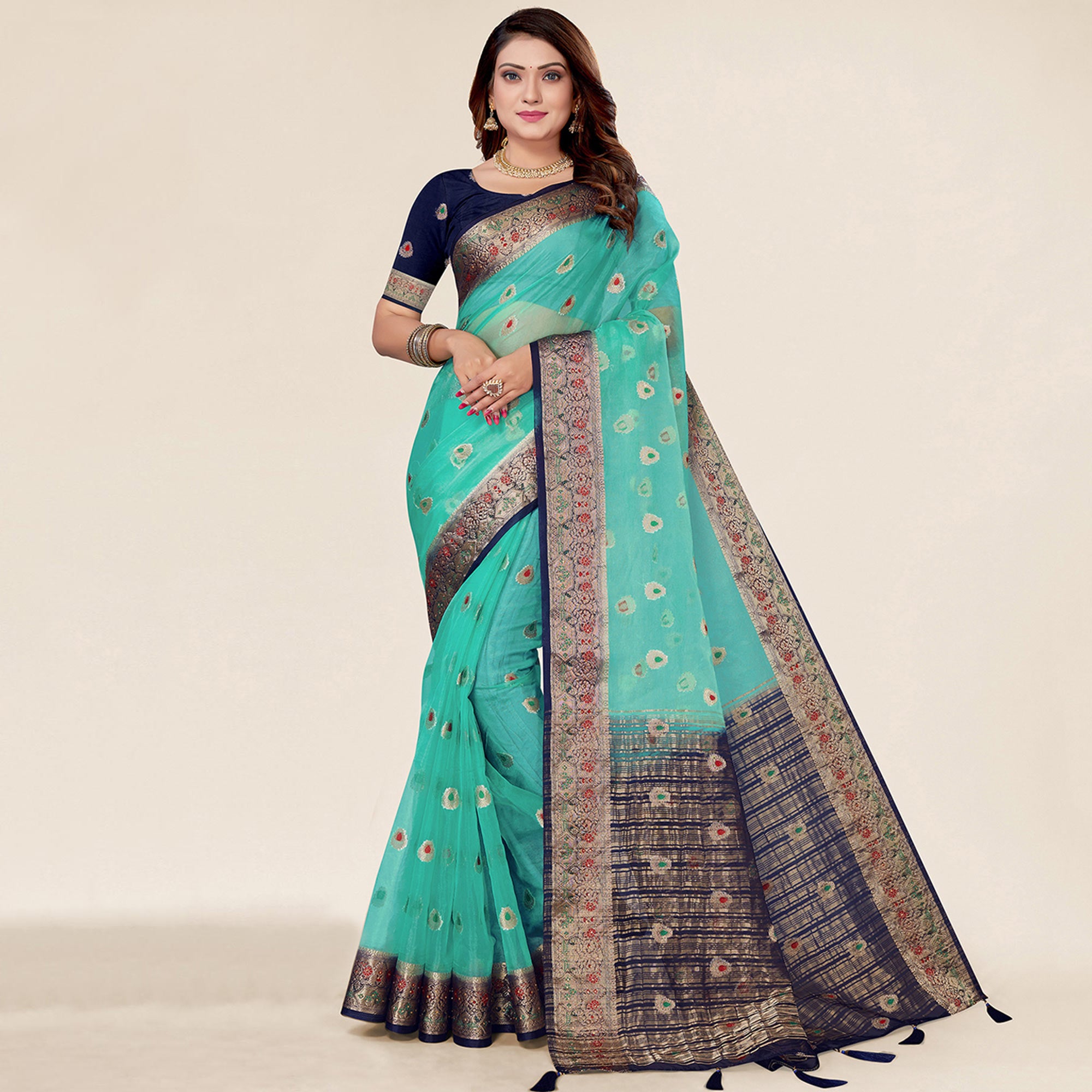 Turquoise Woven Organza Saree With Tassels