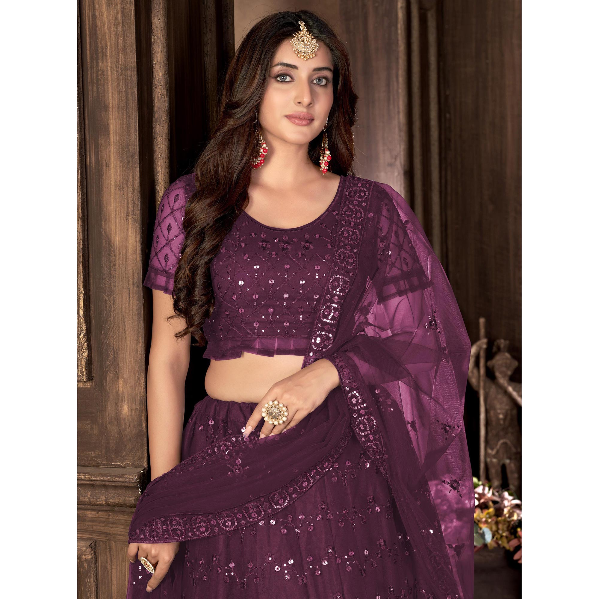 Wine Sequins Embroidered Netted Lehenga Choli