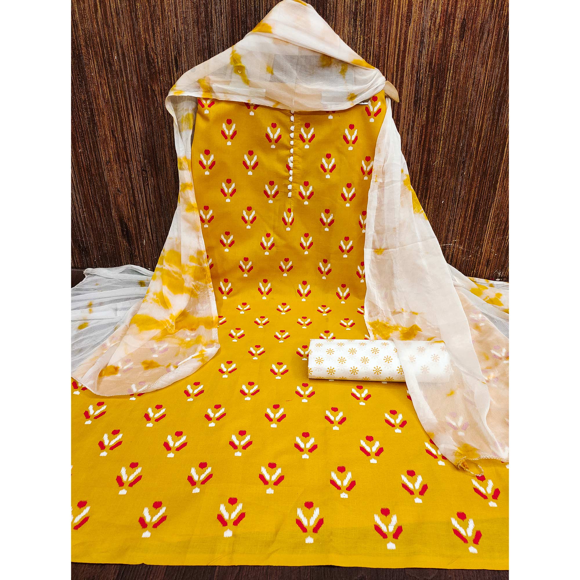Yellow Ikkat Printed Cotton Blend Dress Material