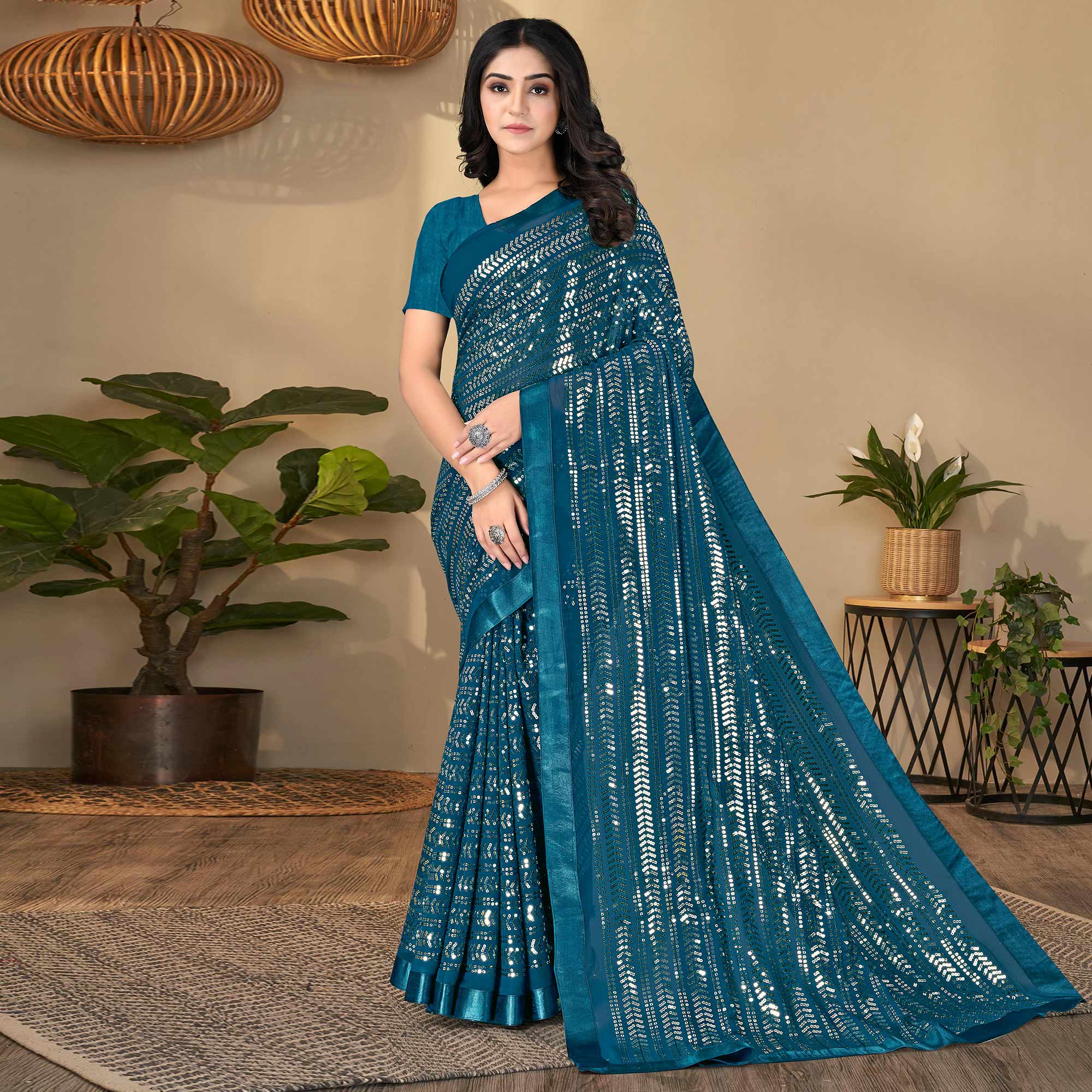 Teal Blue Sequins Embroidered Georgette Saree