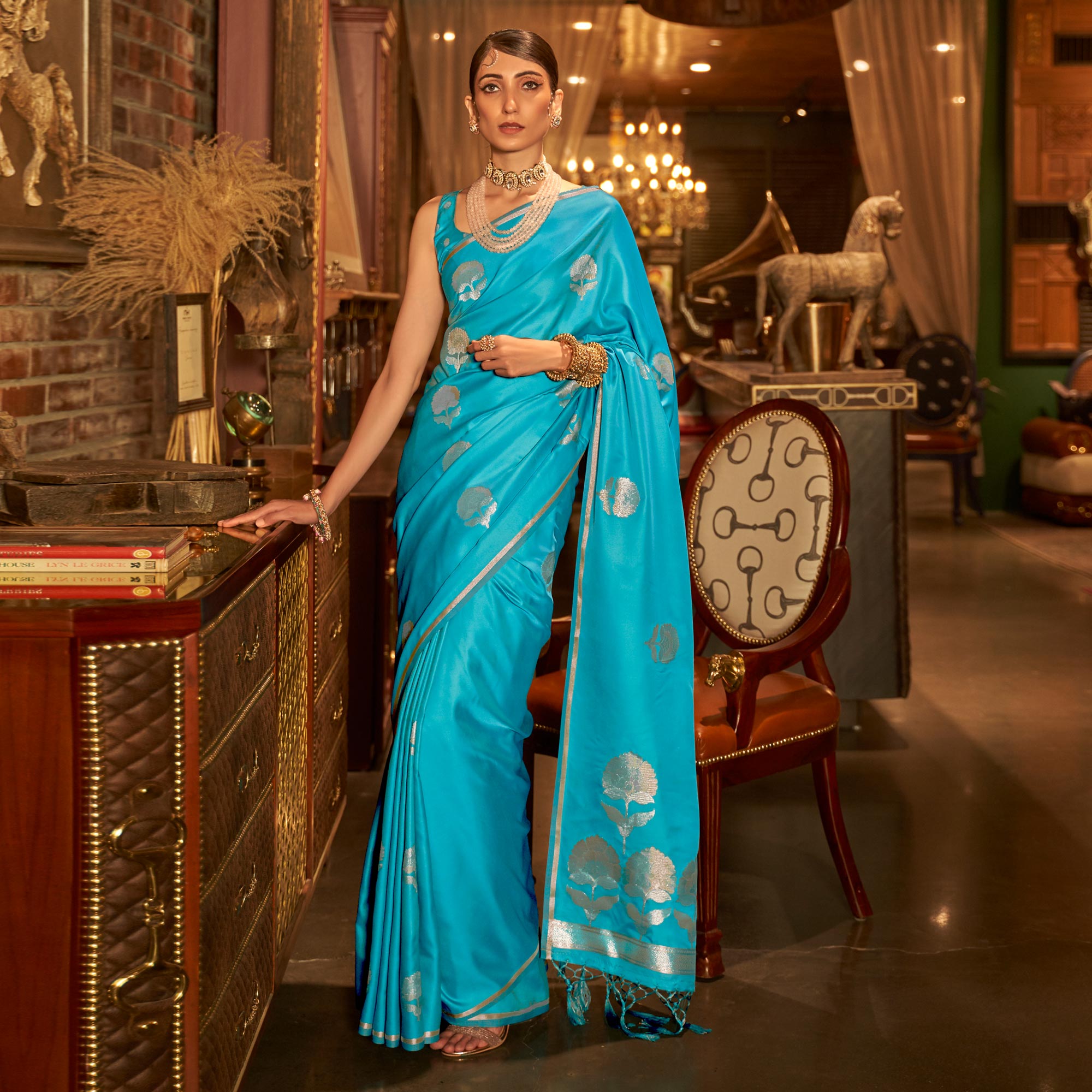 Blue Floral Woven Satin Saree With Tassels