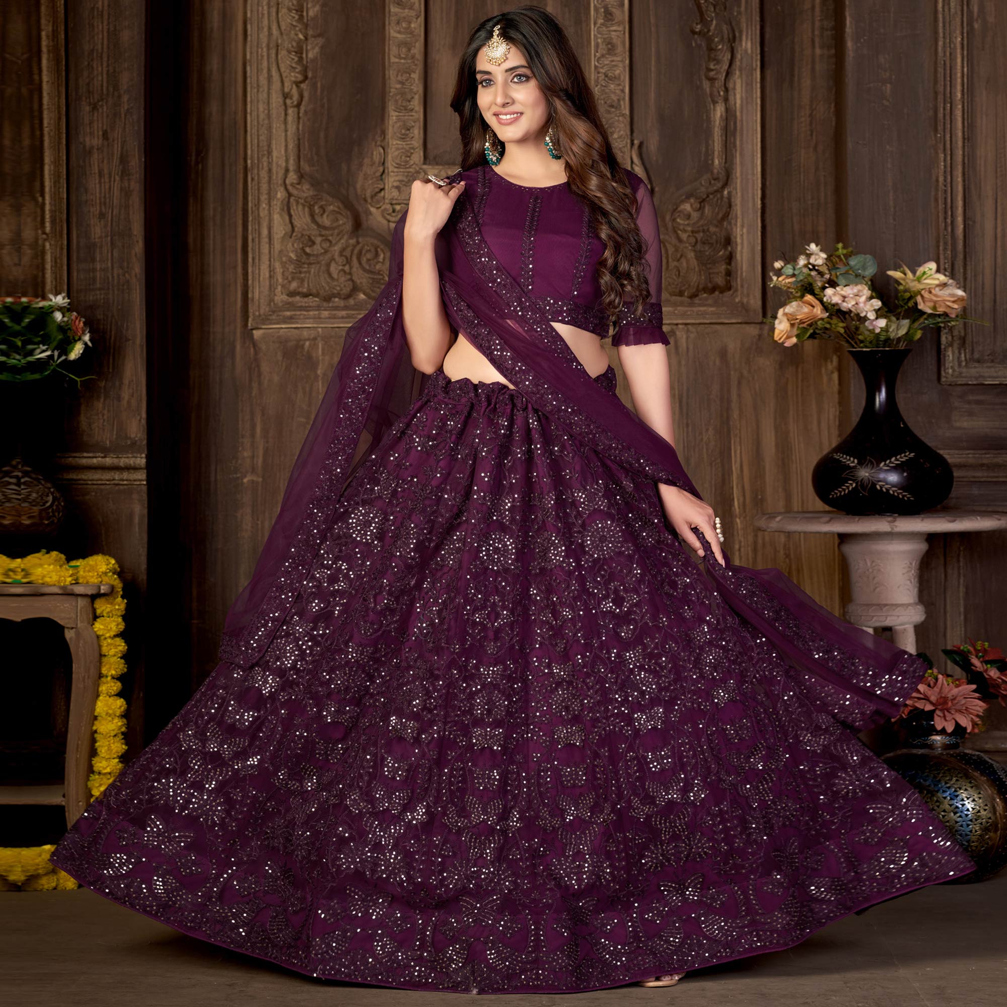 Wine Sequins Embroidered Netted Lehenga Choli