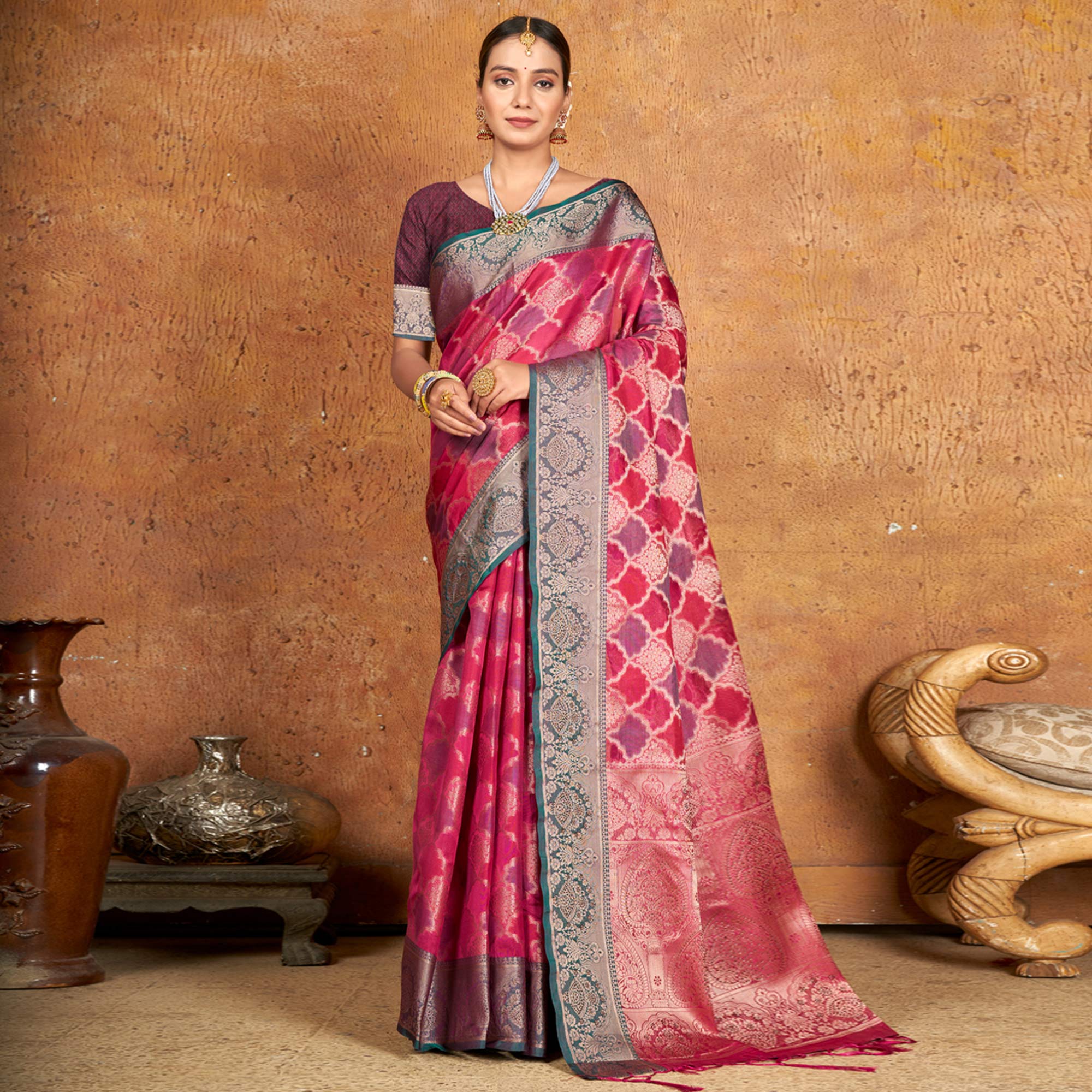 Pink Woven Organza Saree With Tassels