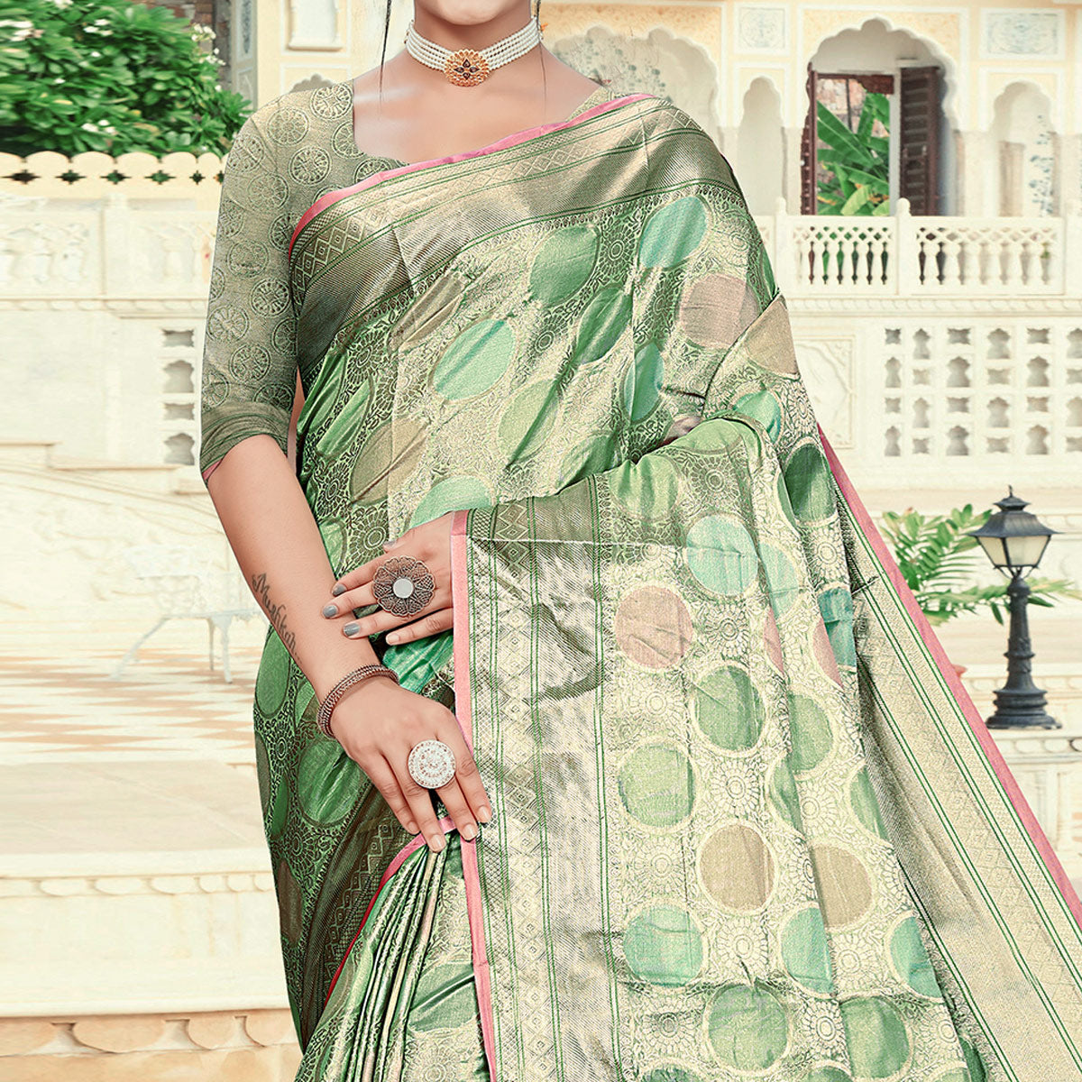 Green Floral Woven Organza Saree With Tassels