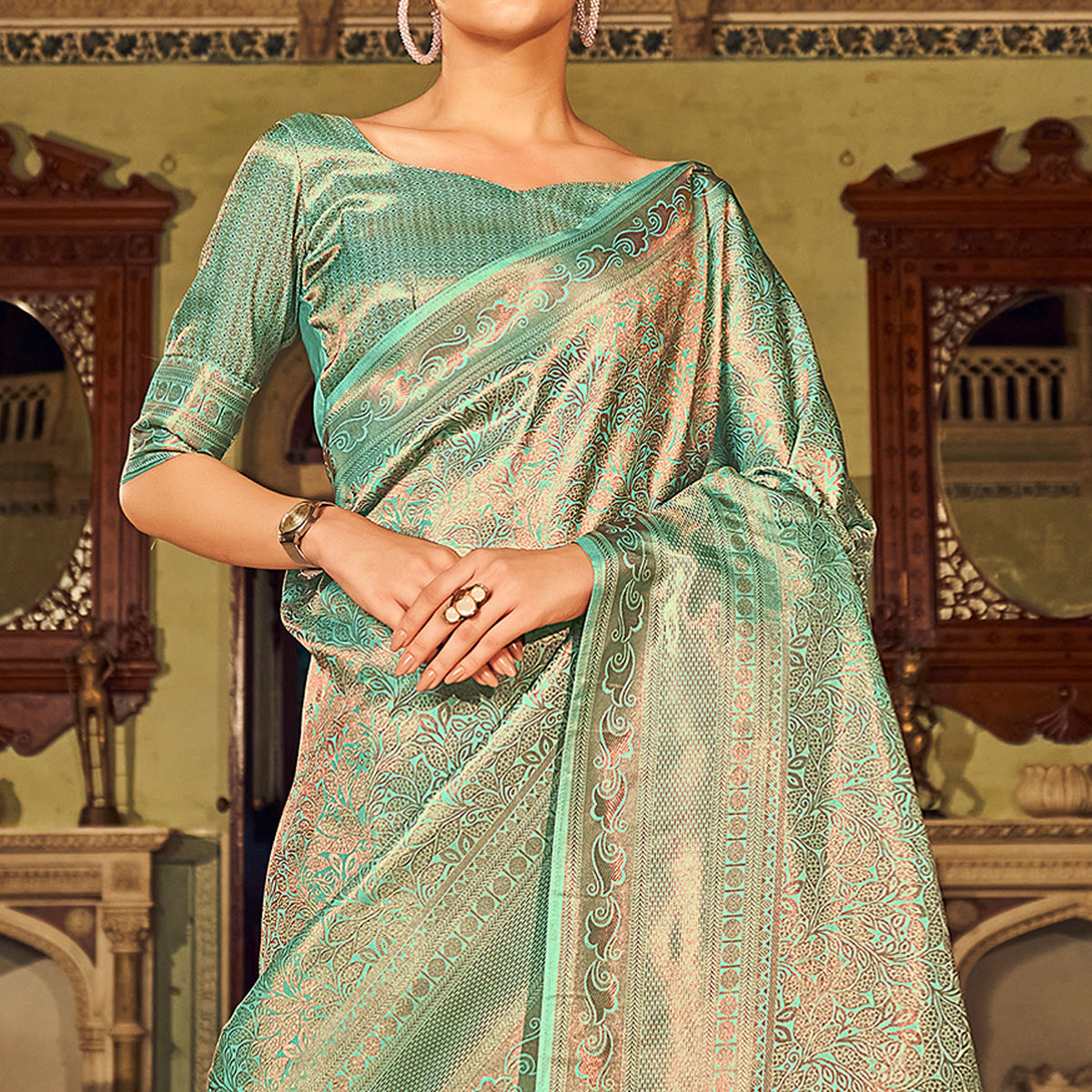 Turquoise Woven Kanjivaran Satin Saree