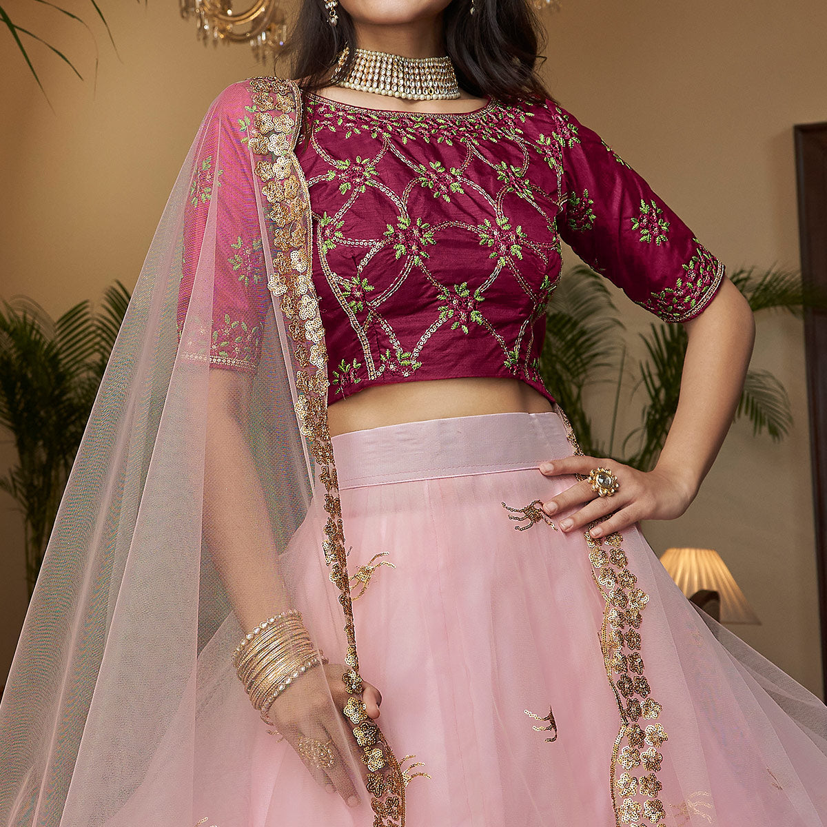 Baby Pink Sequins Embroidered Netted Lehenga Choli