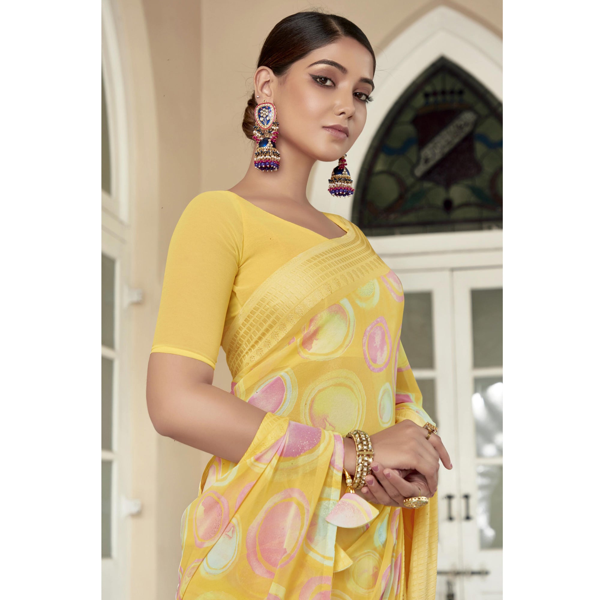 Yellow Printed Georgette Saree With Checks Border