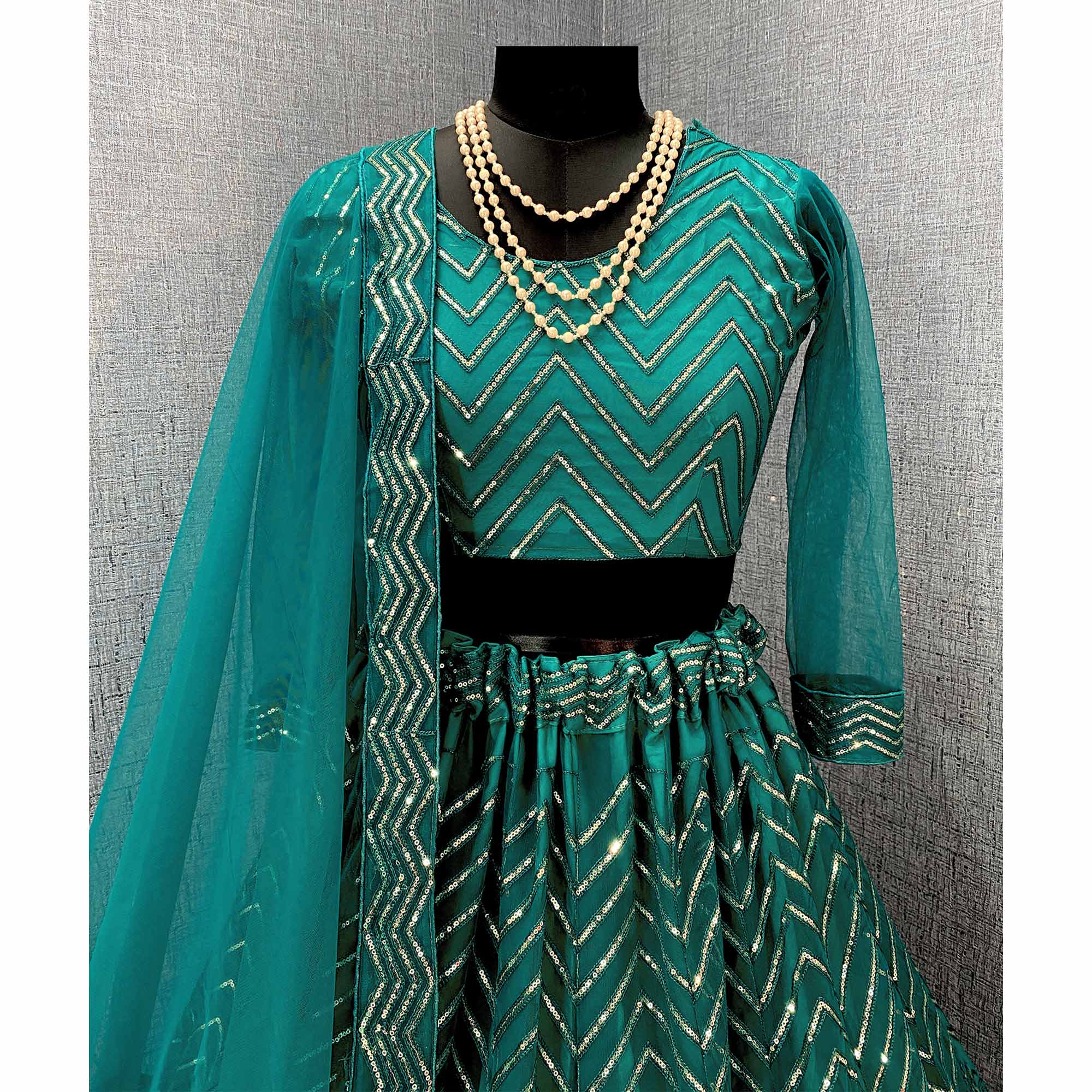 Rama Green Sequins Embroidered Netted Lehenga Choli