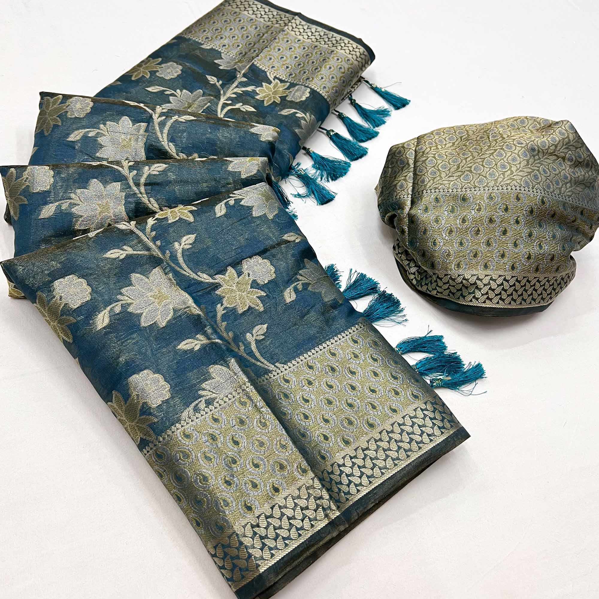 Teal Blue Floral Woven Organza Saree With Tassels