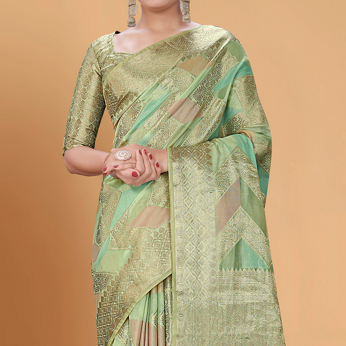 Green Woven Organza Saree With Tassels