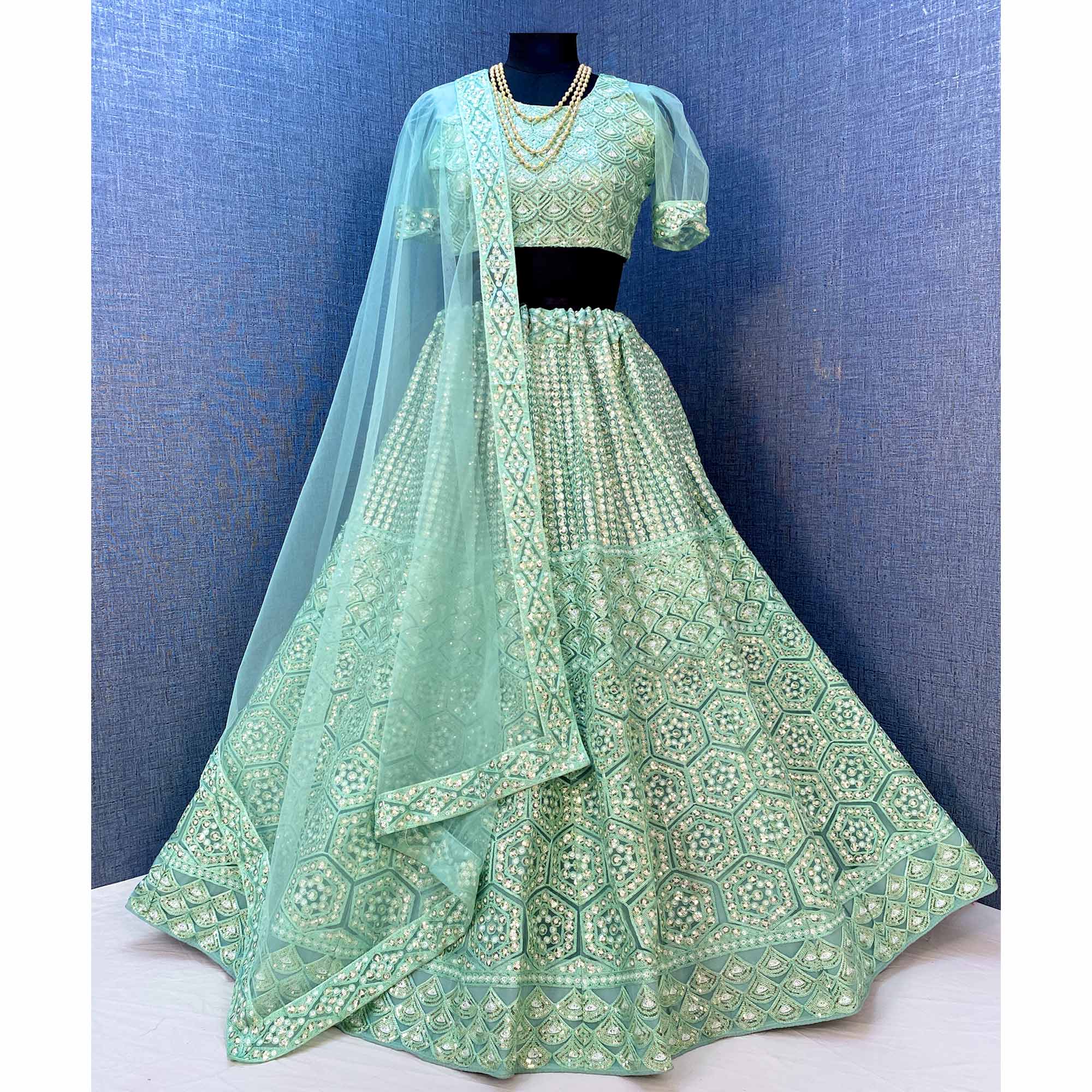 Sea Green Sequins Embroidered Netted Lehenga Choli