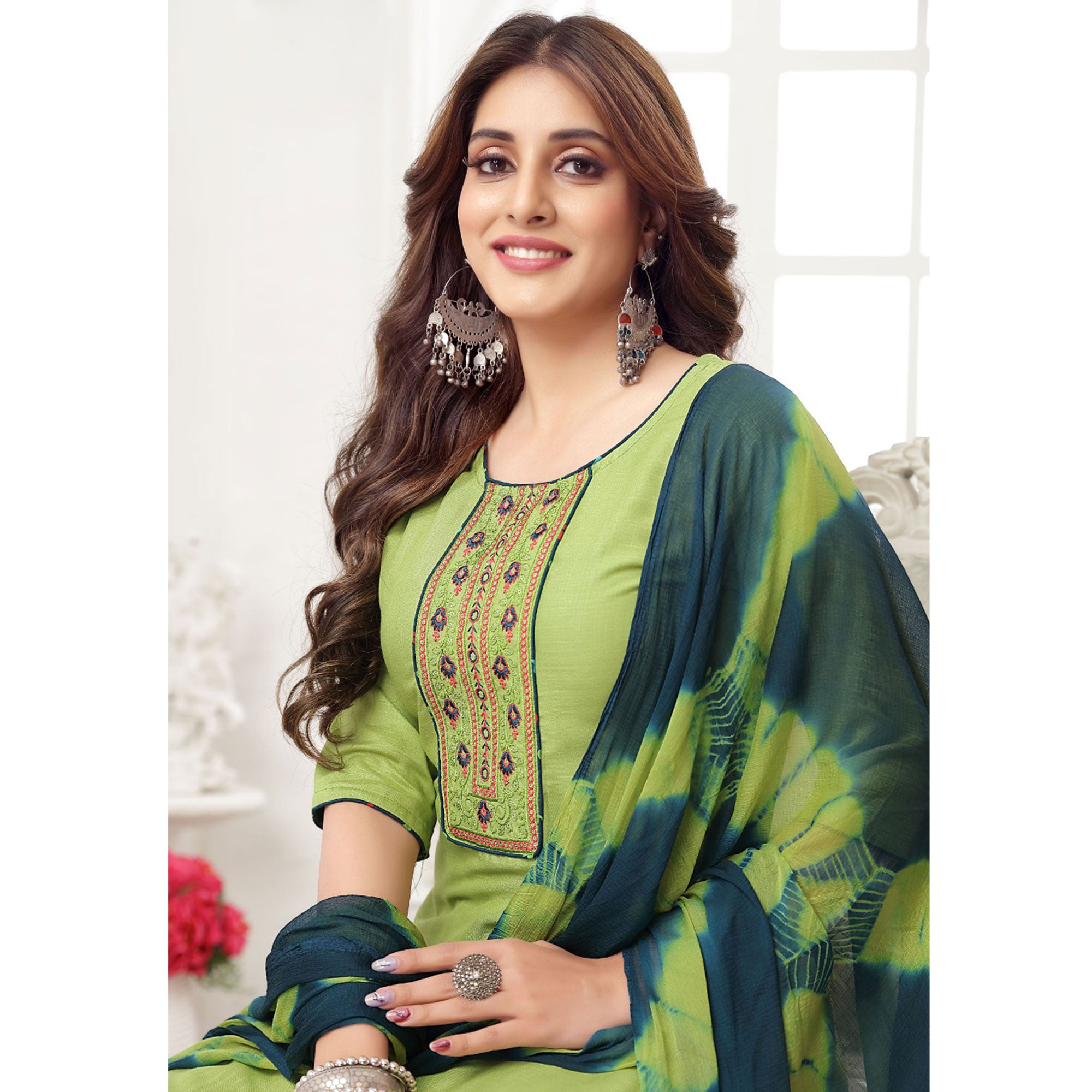 Pista Green Embroidered Rayon Patiala Suit