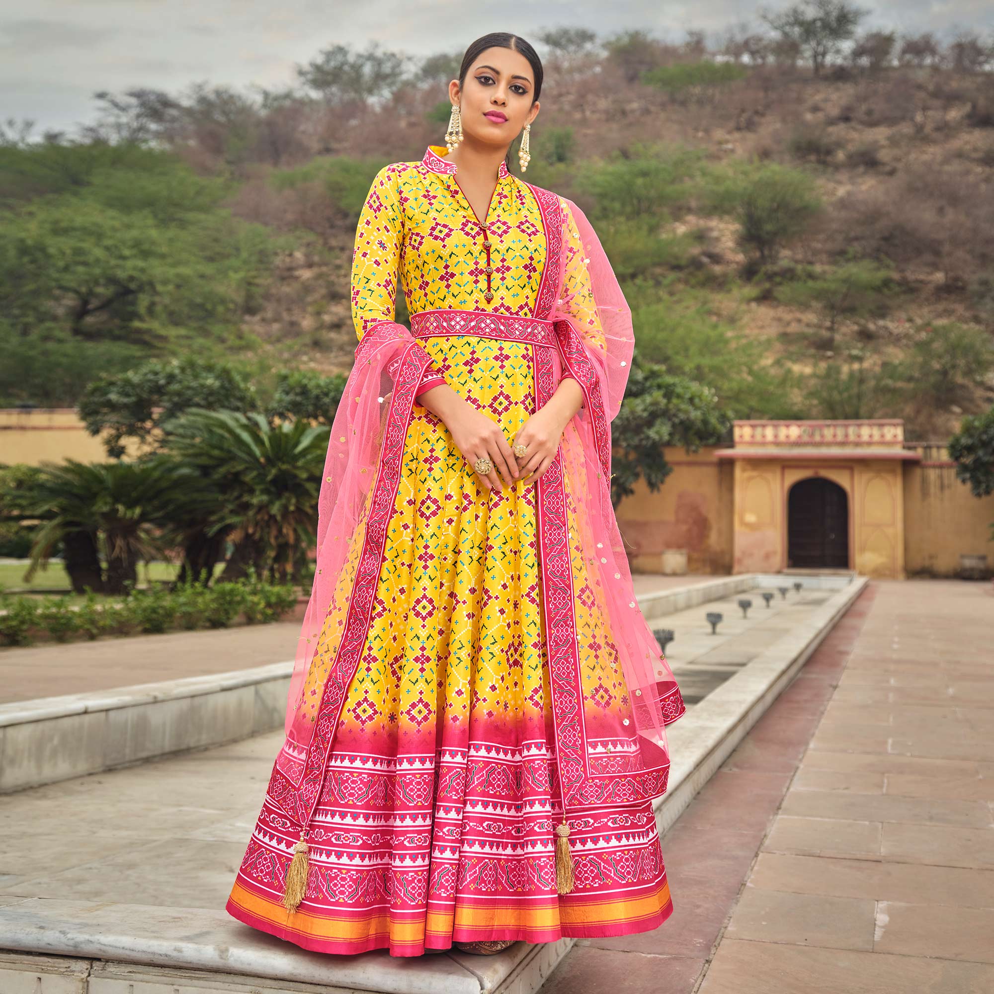 Yellow Patola Digital Printed Dola Silk Gown