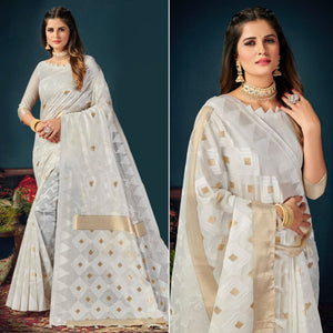 White Woven Cotton Blend Saree With Tassels