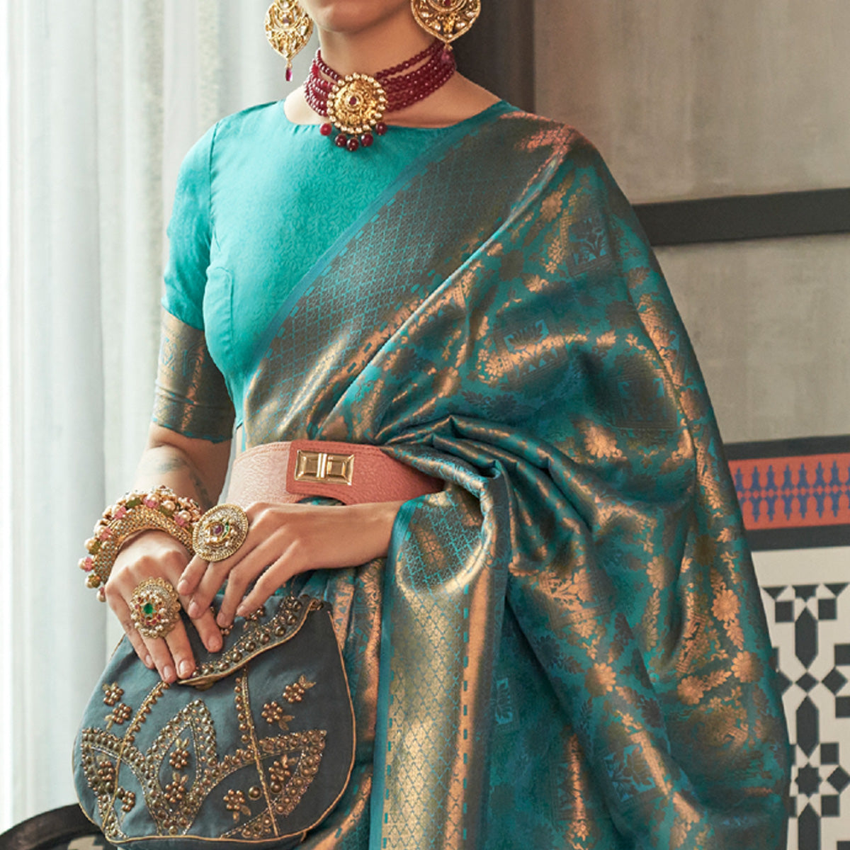 Turquoise Woven Art Silk Saree With Tassels