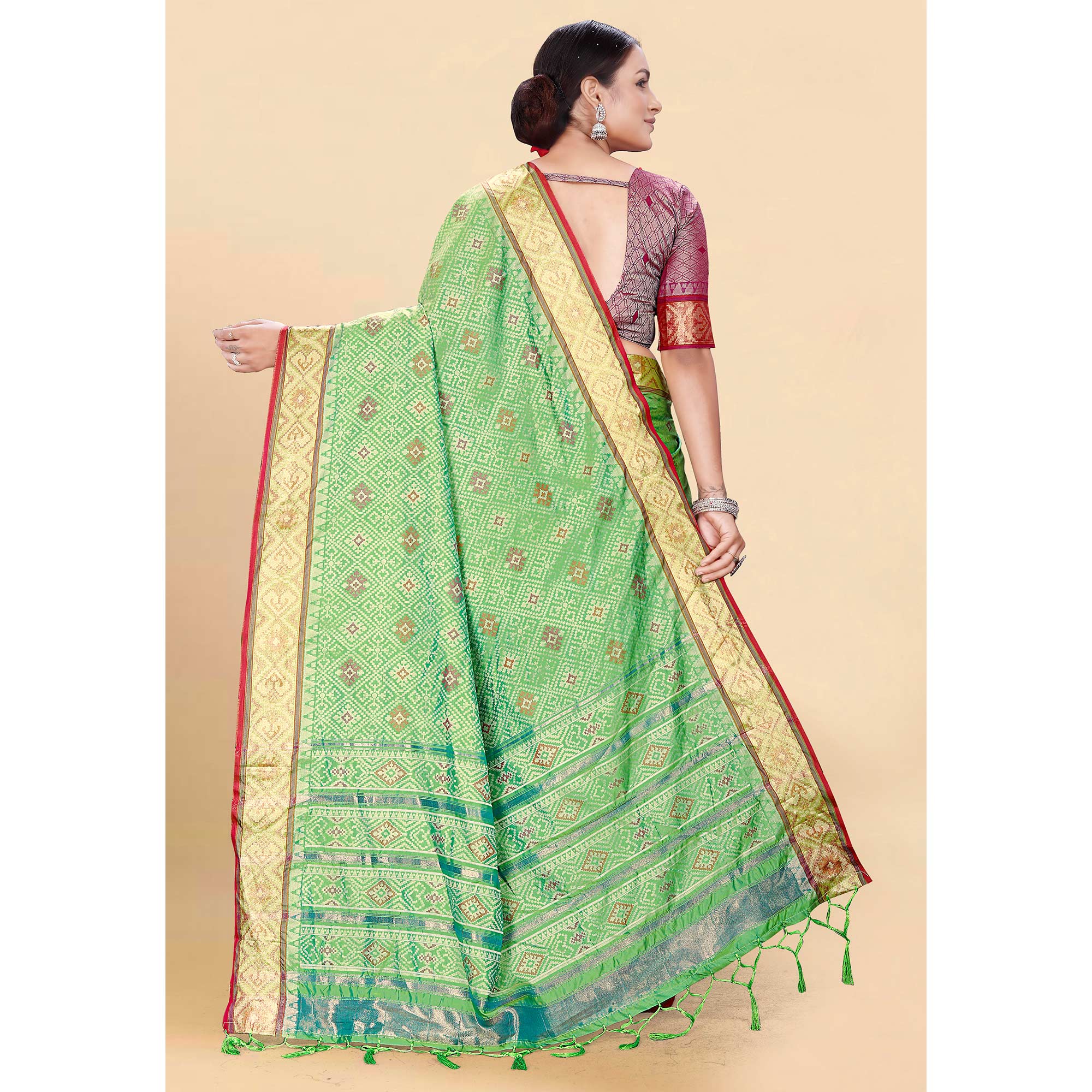 Green Woven Patola Art Silk Saree With Tassels