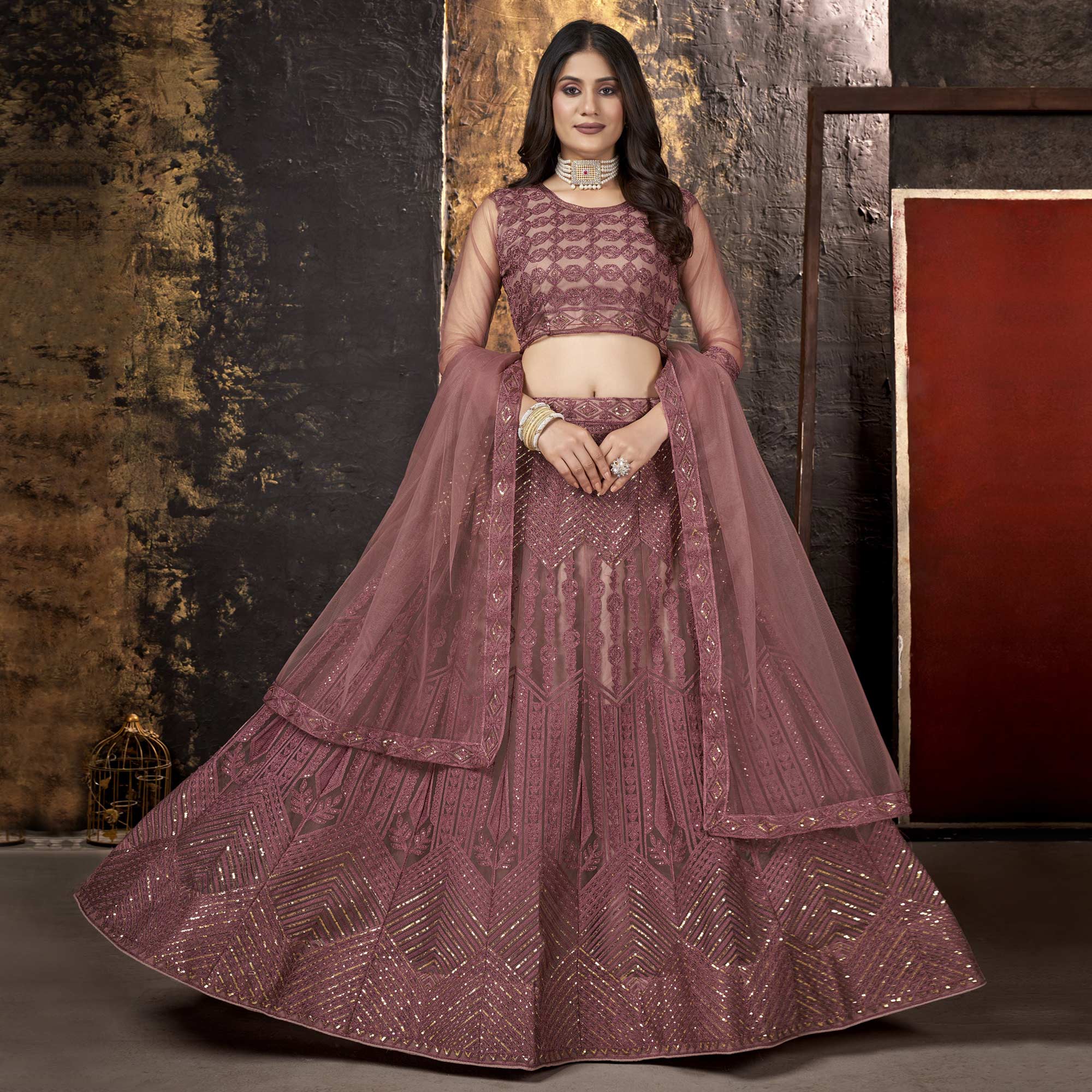 Dusty Pink Sequins Embroidered Net Lehenga Choli