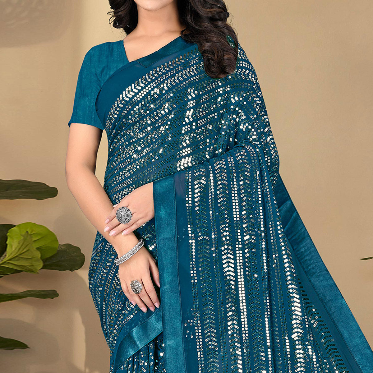 Teal Blue Sequins Embroidered Georgette Saree