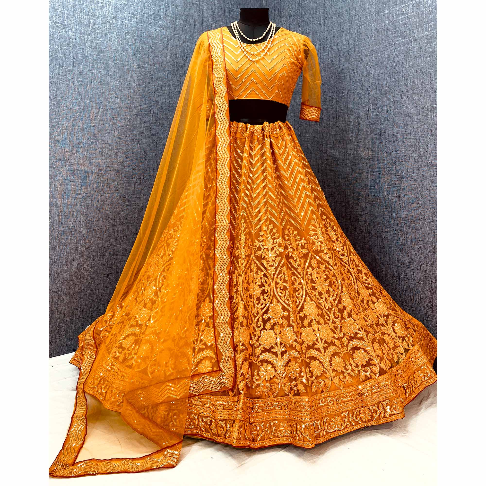 Mustard Sequins Embroidered Netted Lehenga Choli