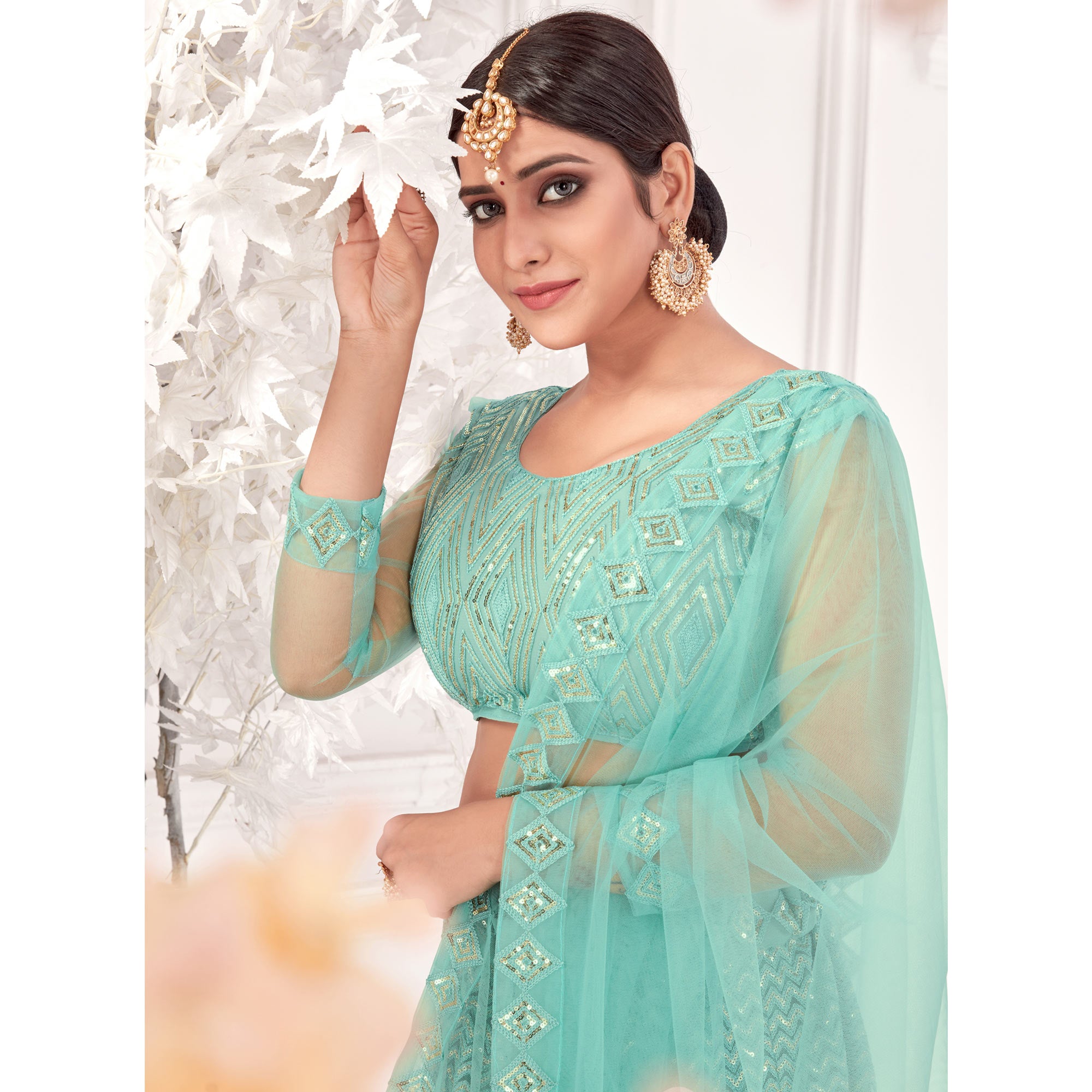 Sea Green Sequins Embroidered Netted Lehenga Choli