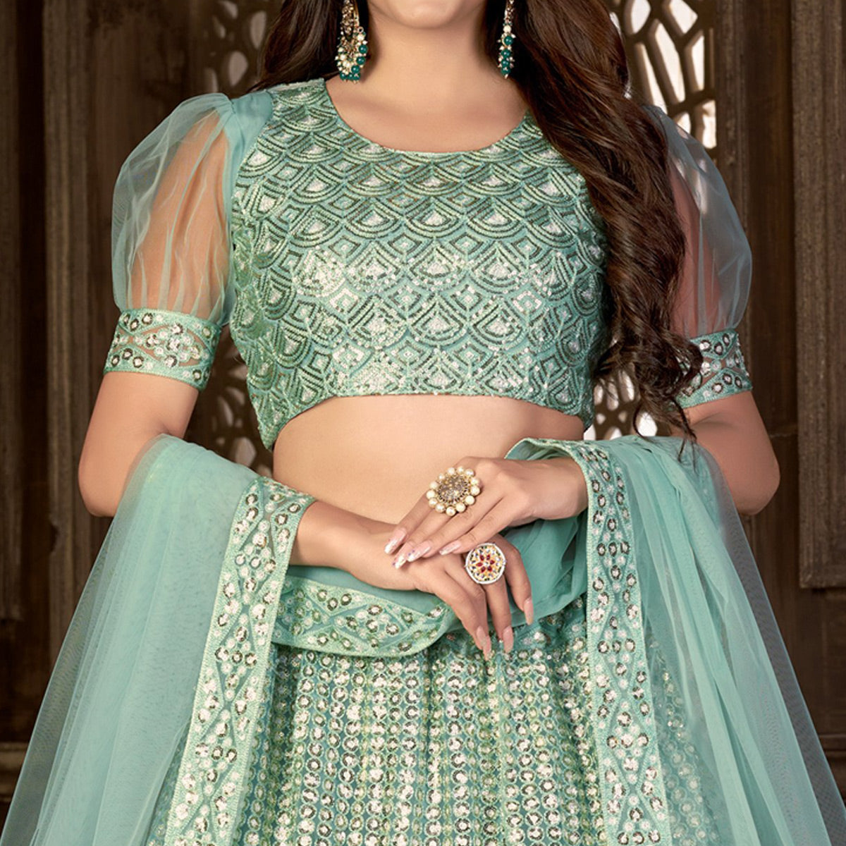 Sea Green Sequins Embroidered Netted Lehenga Choli