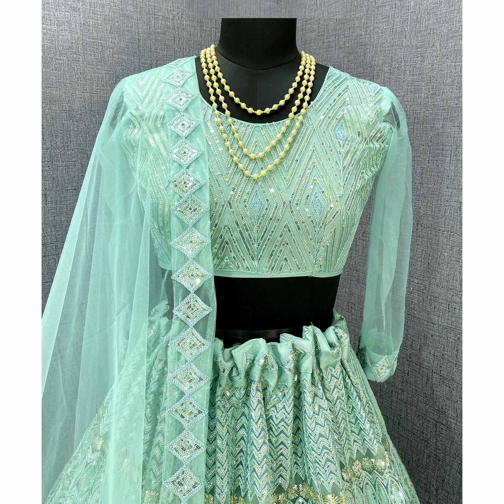 Sea Green Sequins Embroidered Netted Lehenga Choli