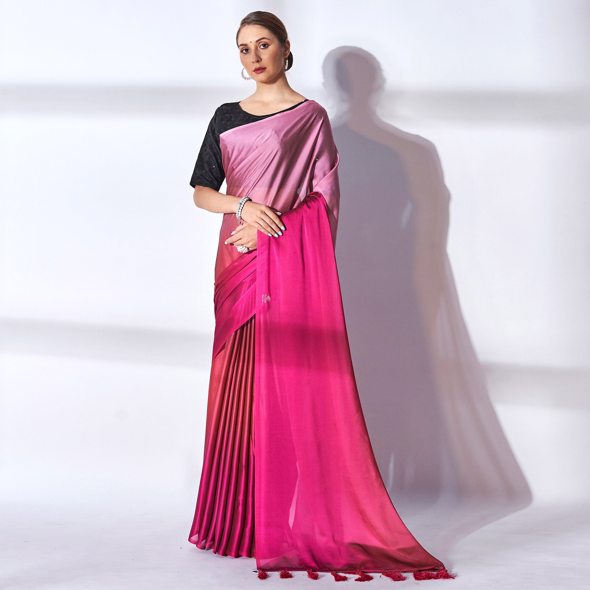 Pink Solid Georgette Saree With Tassels