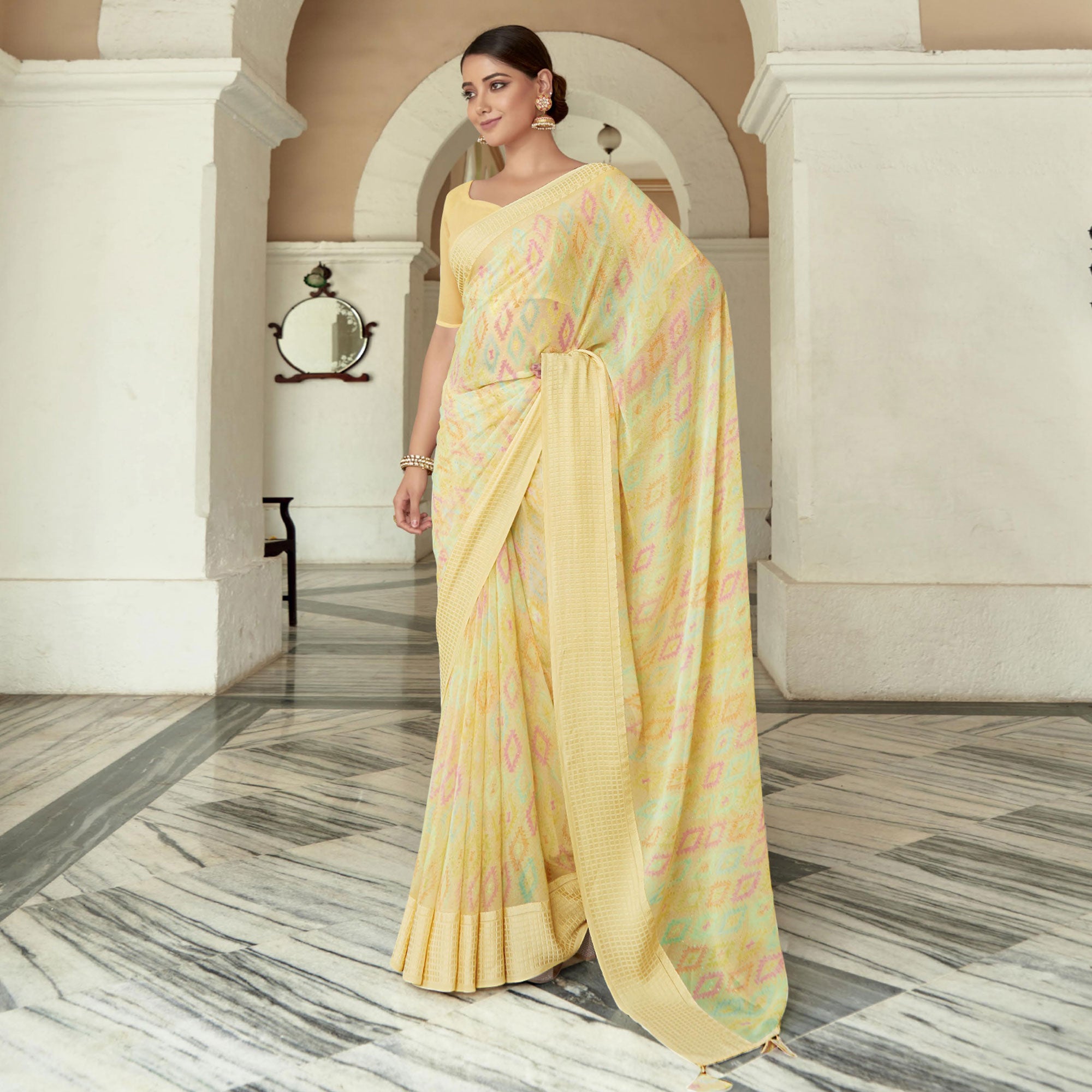 Yellow Printed Georgette Saree With Checks Border