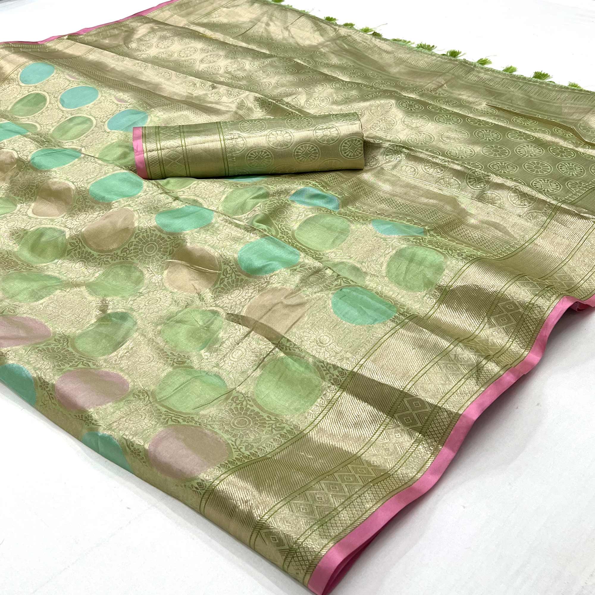 Pista Green Floral Woven Organza Saree With Tassels