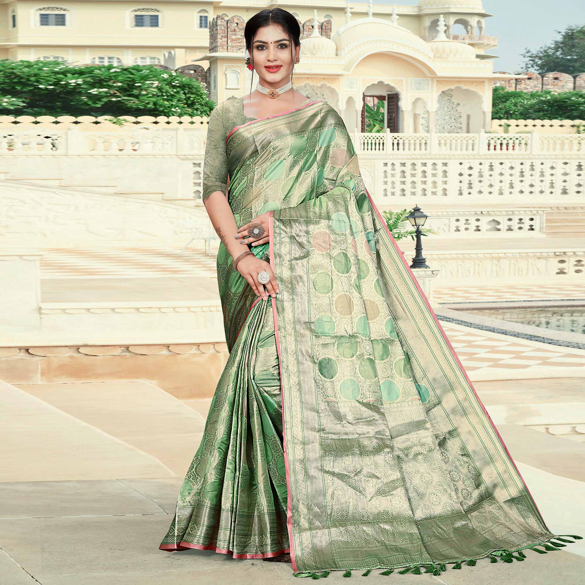 Green Floral Woven Organza Saree With Tassels