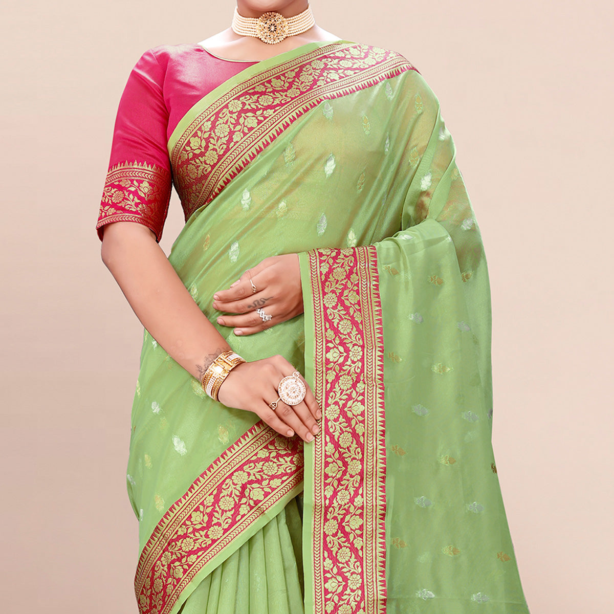 Pista Green Woven Organza Saree With Tassels