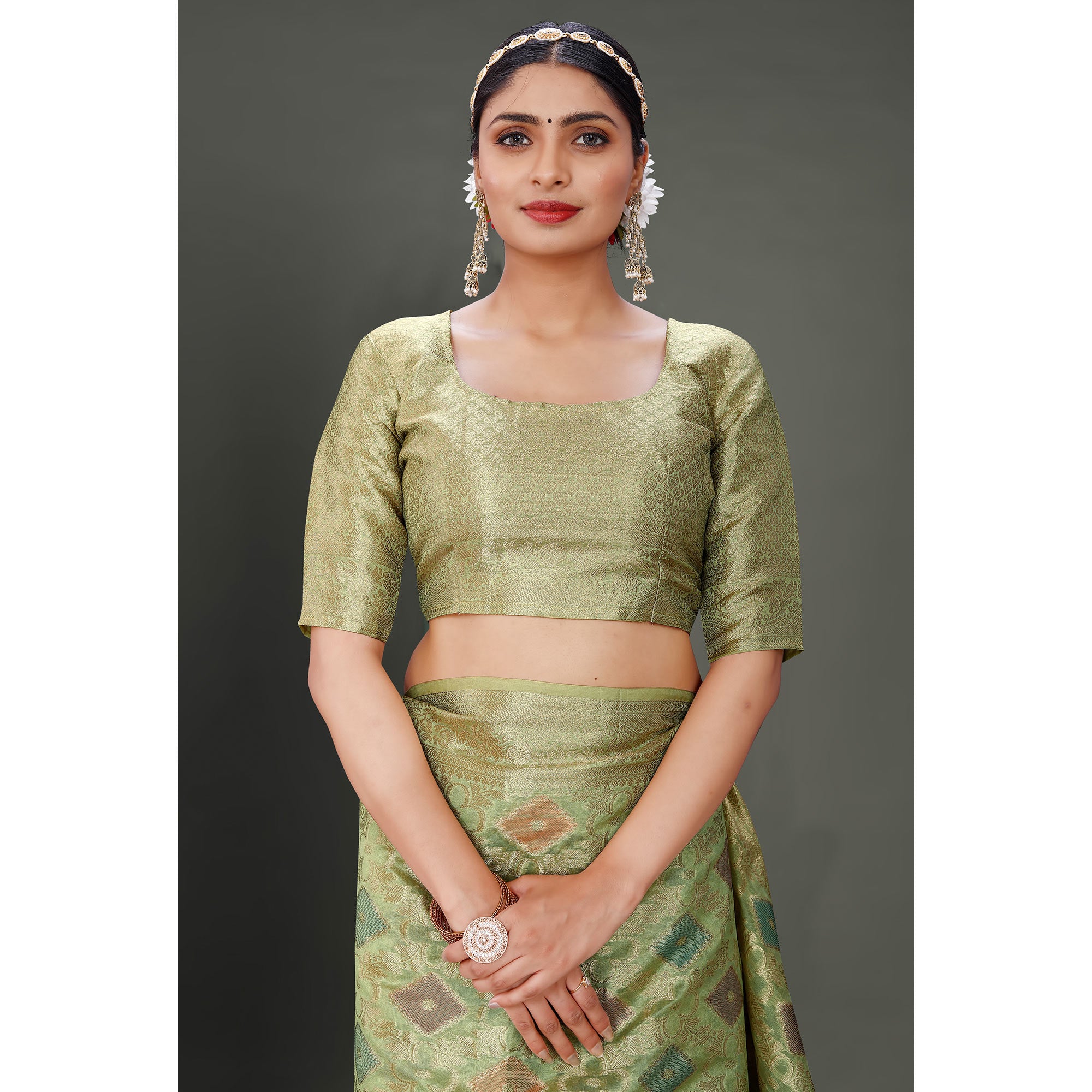 Green Woven Organza Saree With Tassels