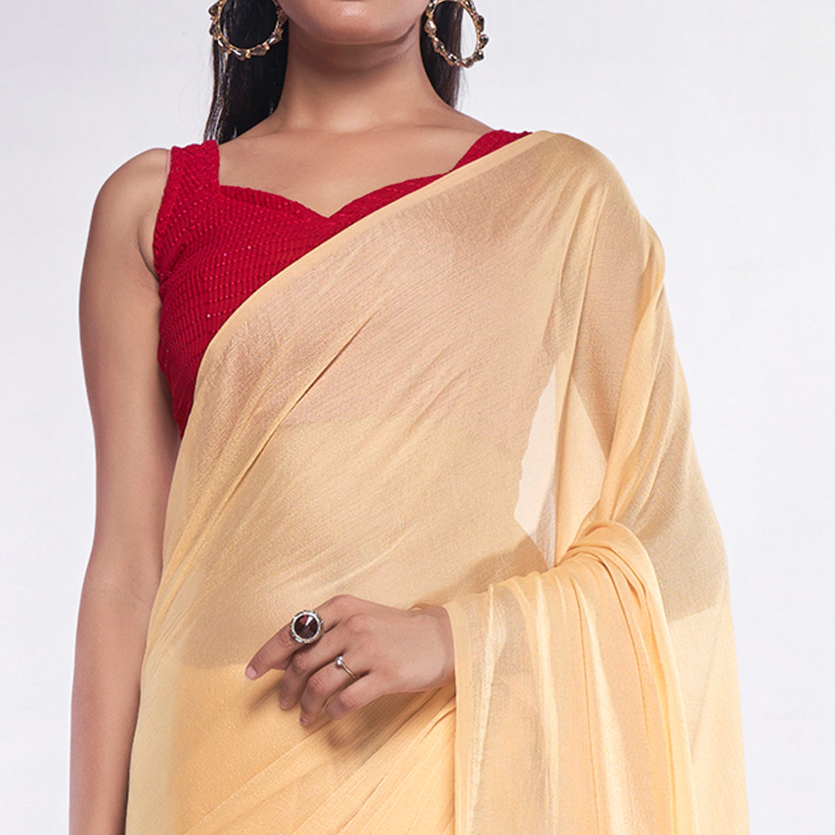 Yellow Solid Georgette Saree With Tassels