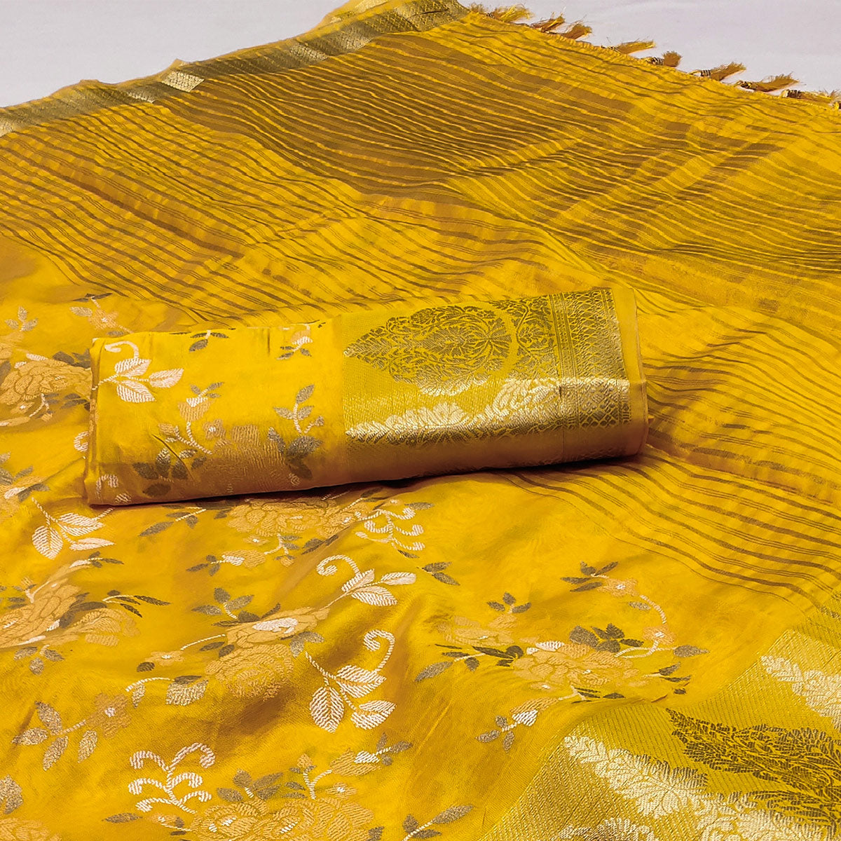 Yellow Woven Organza Saree With Tassels