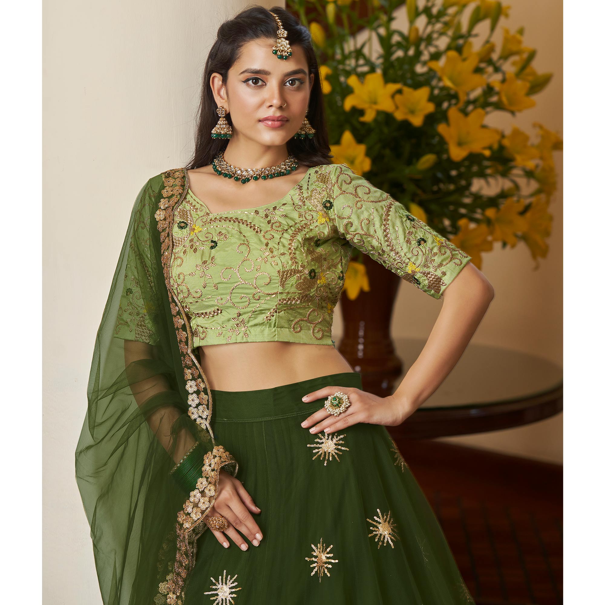 Mehendi Green Sequins Embroidered Netted Lehenga Choli