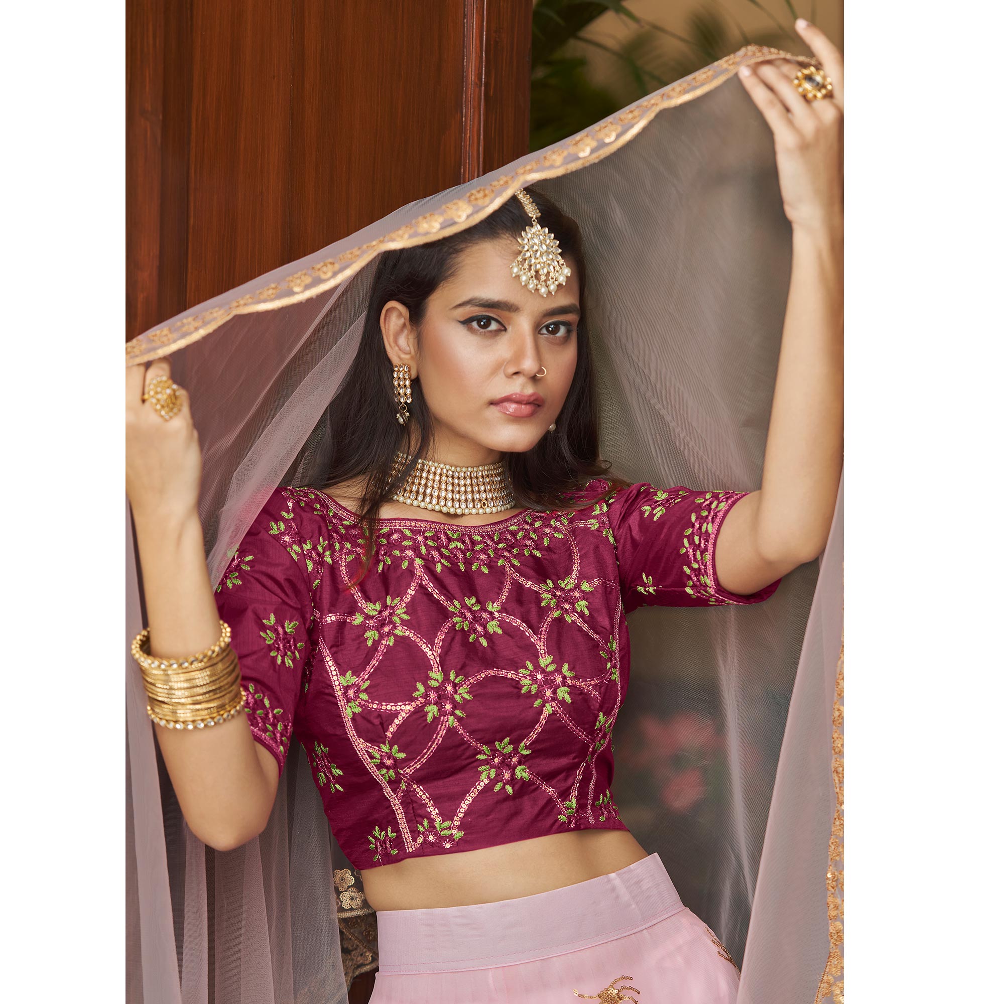 Baby Pink Sequins Embroidered Netted Lehenga Choli