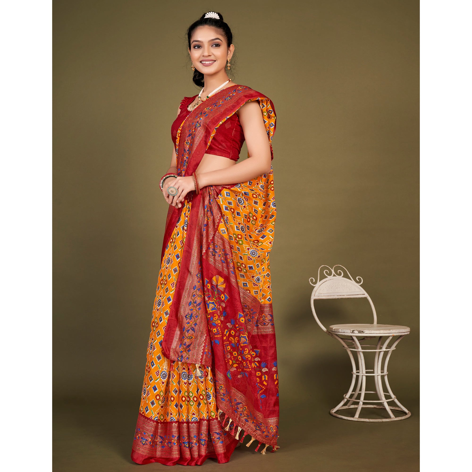 Yellow Printed Jute Patola Saree With Tassels