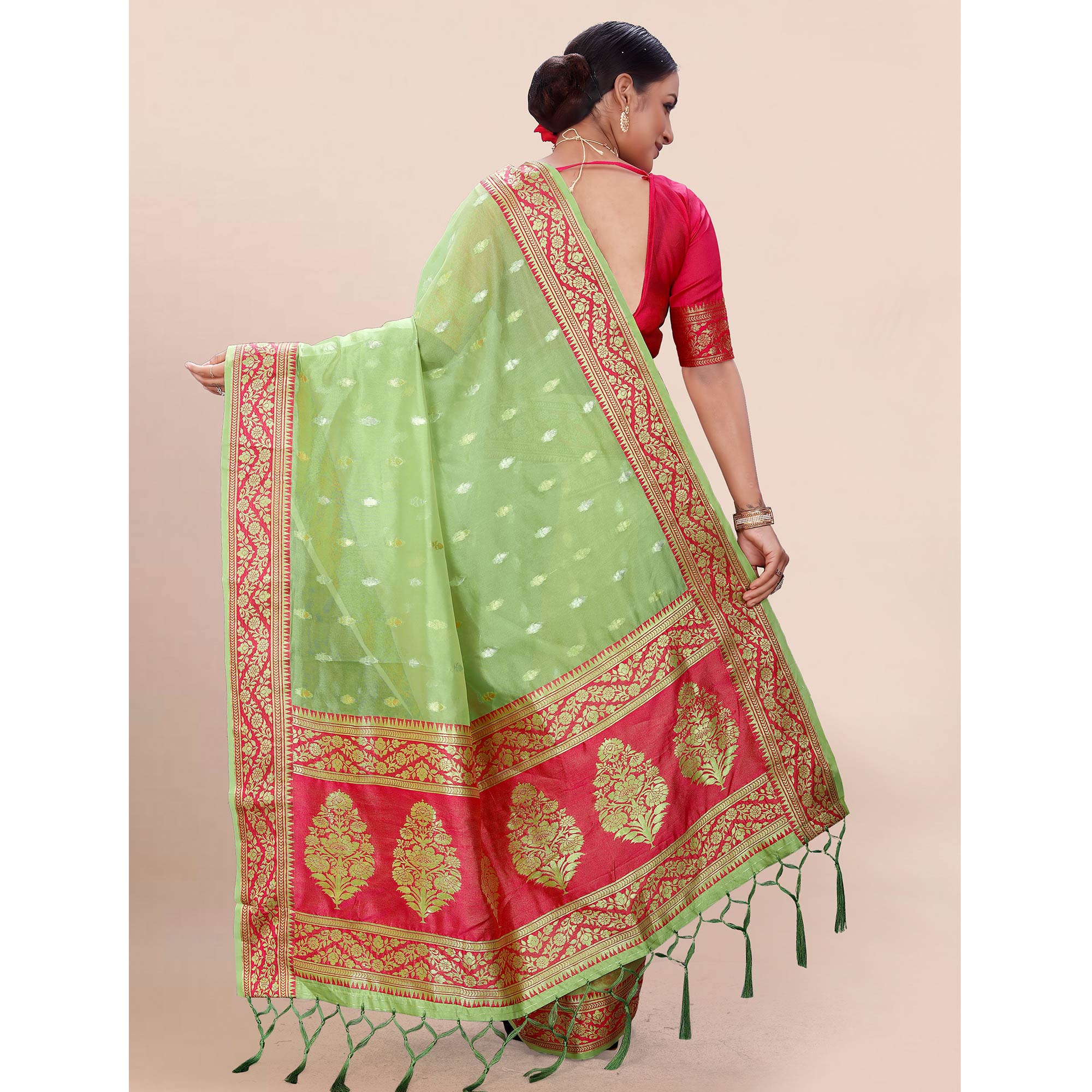 Pista Green Woven Organza Saree With Tassels