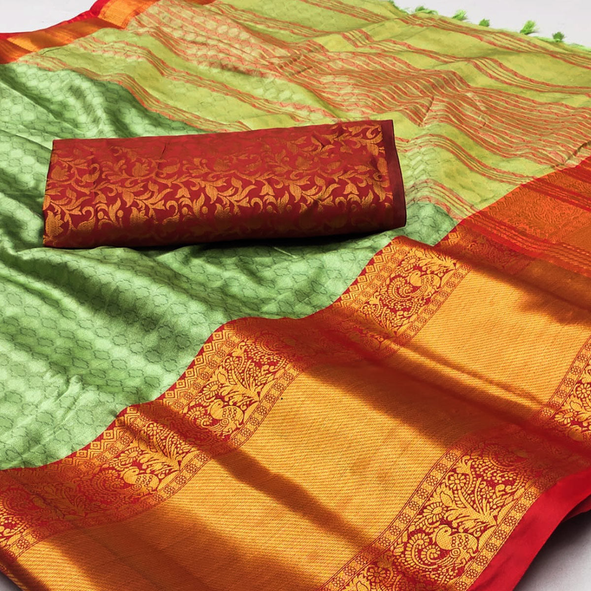 Pista Green Woven Cotton Silk Saree With Tassels